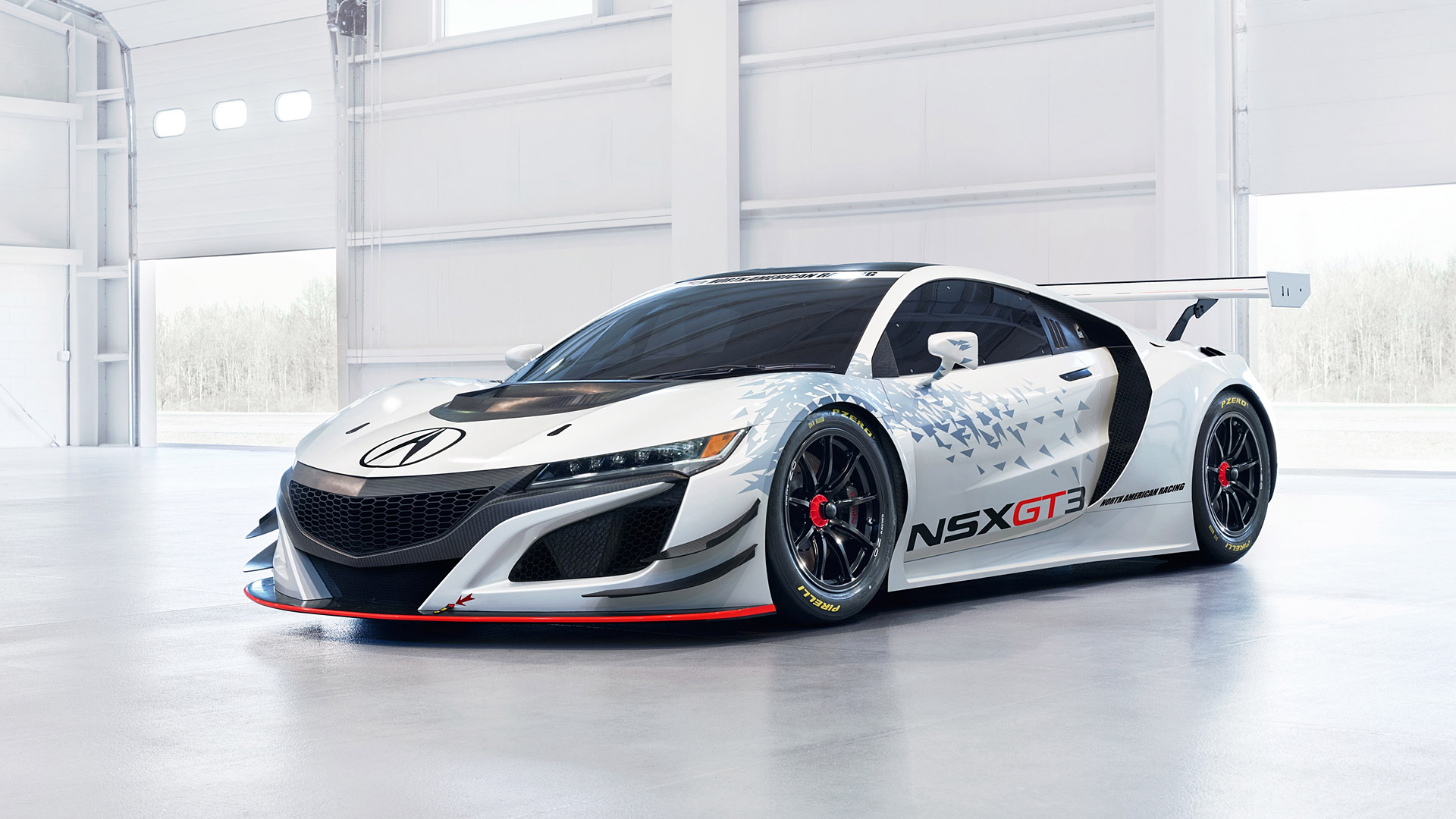 2017 Acura NSX GT3 race car in a garage HD Wallpaper