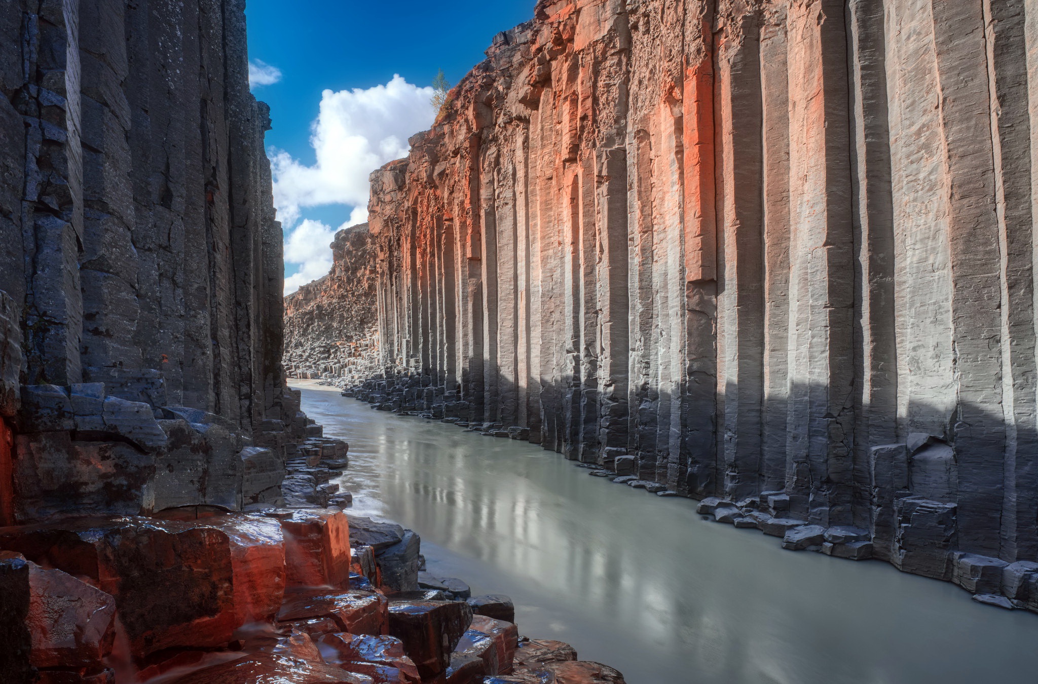 Stuðlagil Canyon in Iceland with a river HD Wallpaper