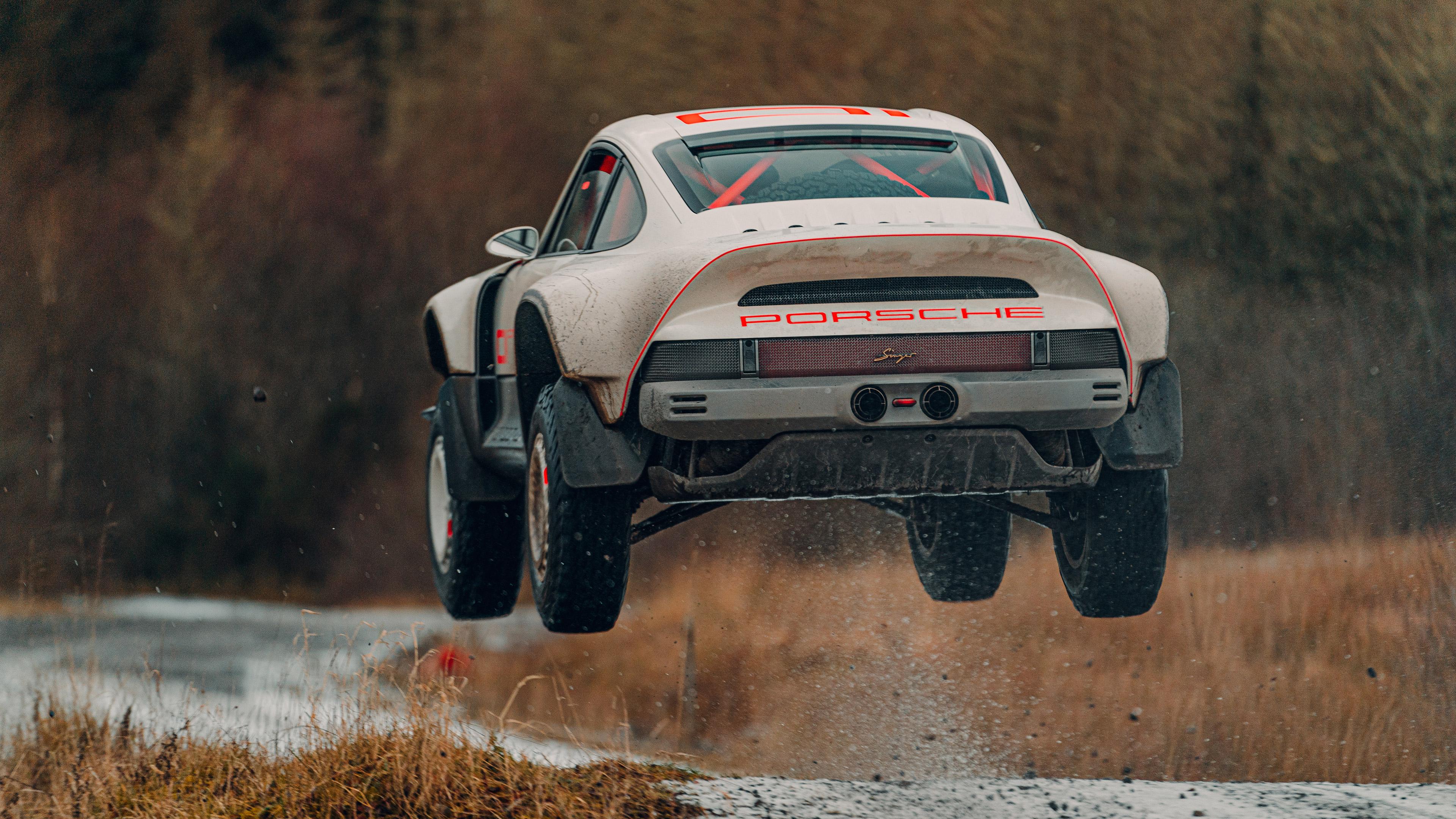 Singer All-terrain Competition Study Porsche jumping HD Wallpaper