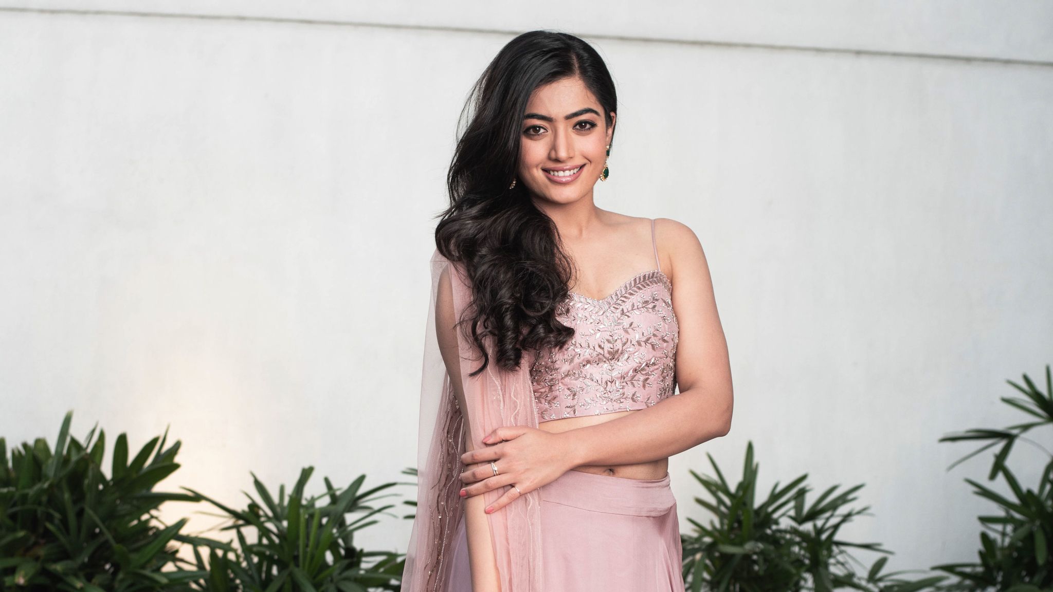 Rashmika Mandanna in a pink lehenga HD Wallpaper