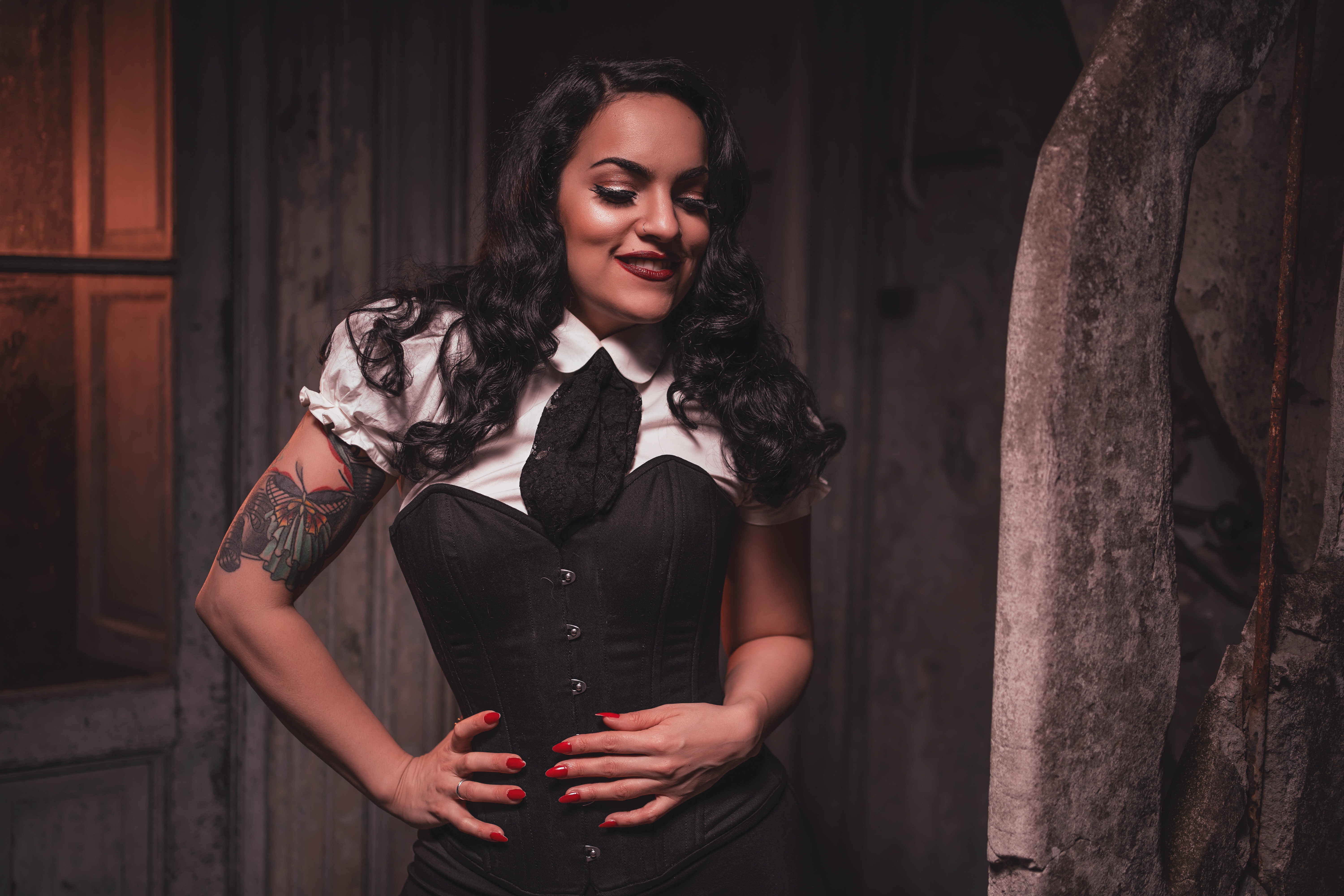 Woman with black hair and butterfly tattoo HD Wallpaper