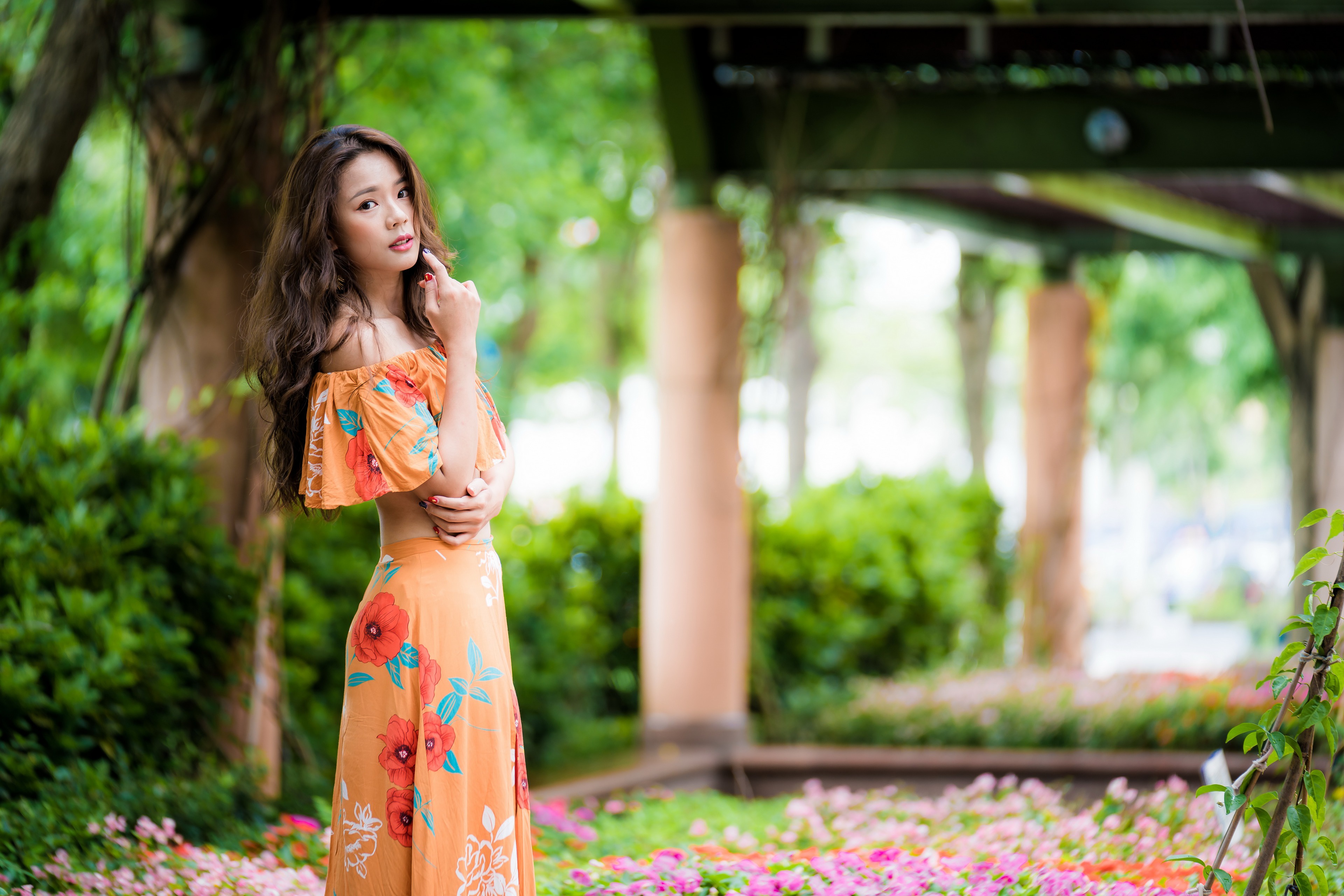Asian Woman with Long Brunette Hair in a Floral Dress HD Wallpaper