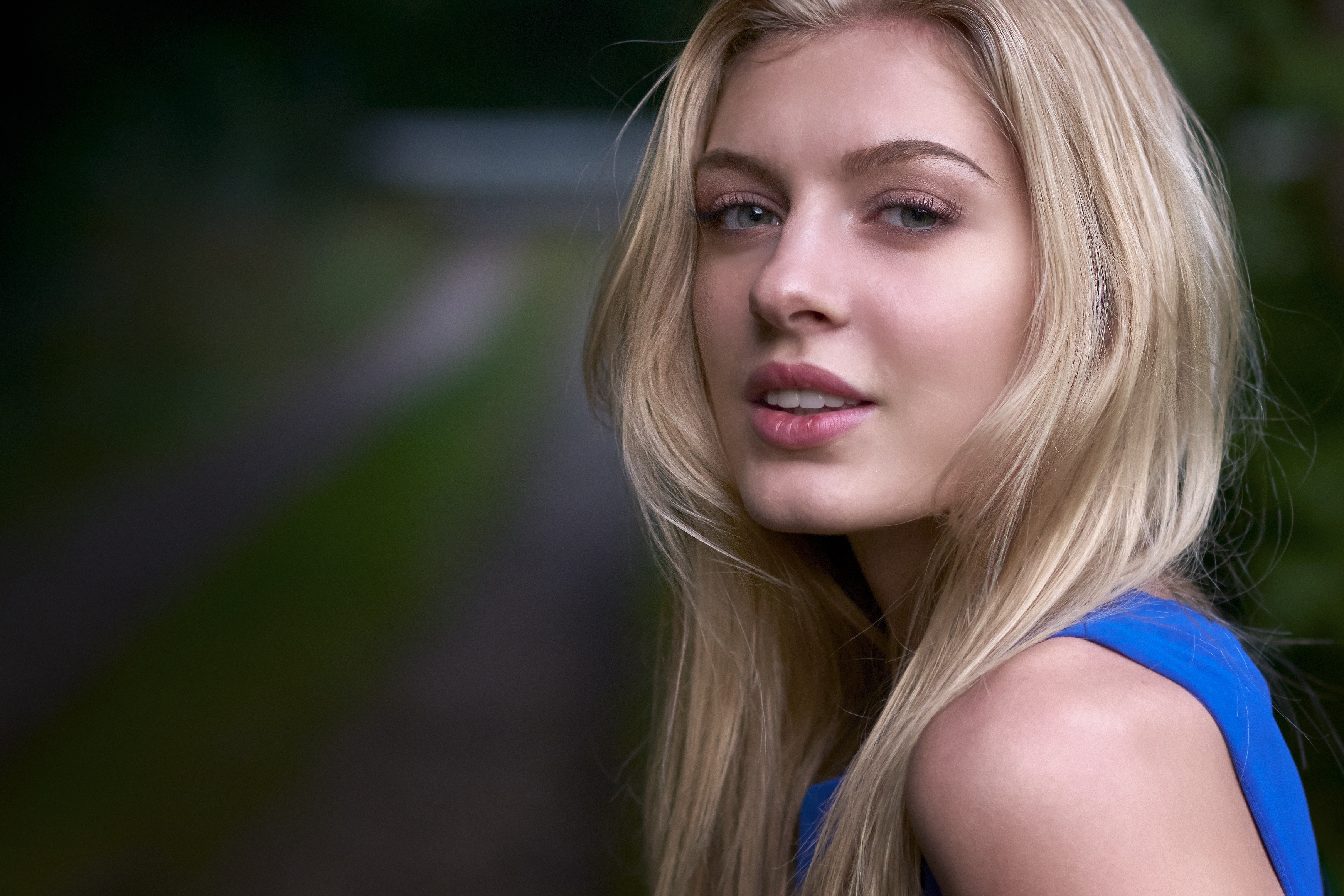 Woman with blonde hair in a blue dress HD Wallpaper
