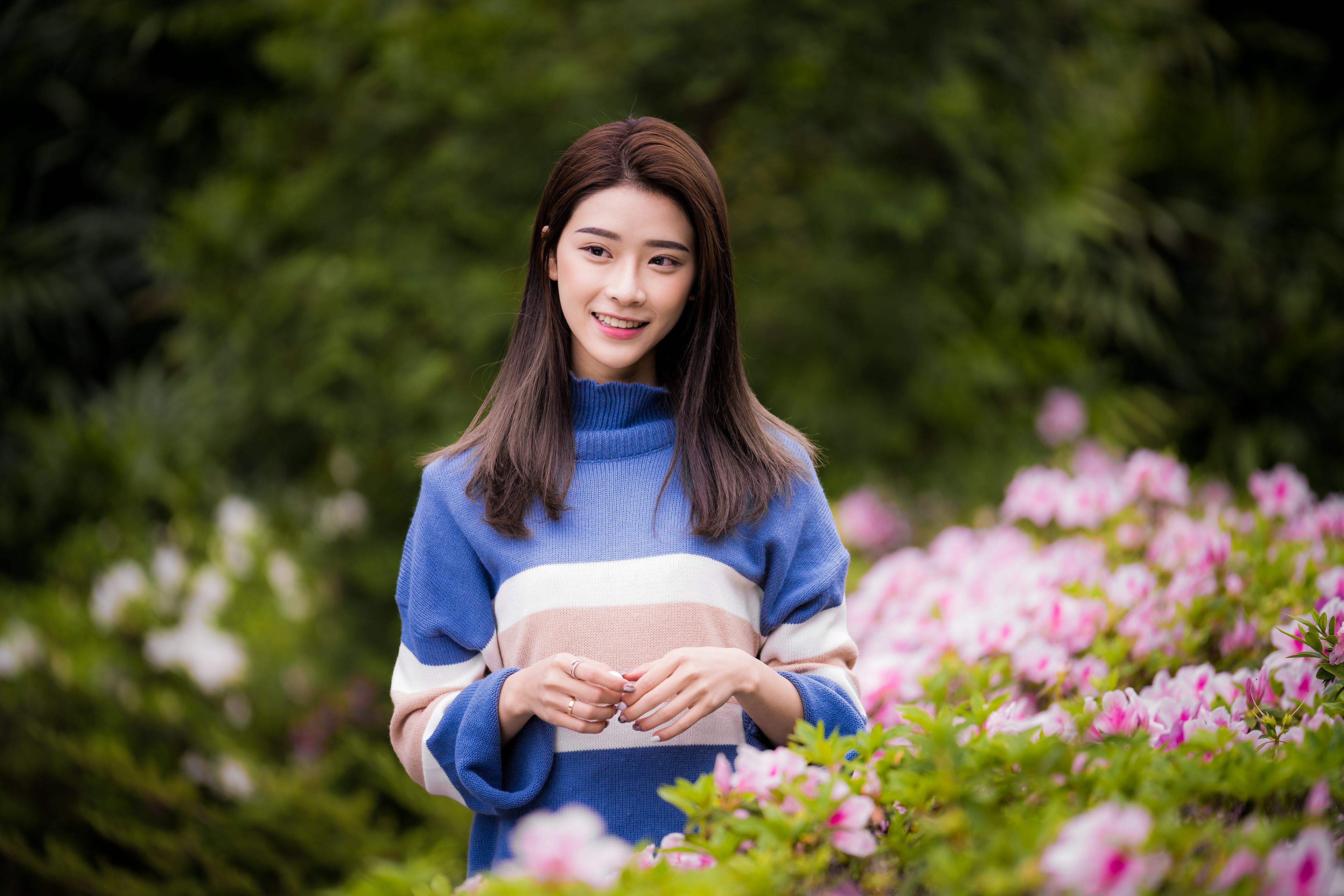 Smiling Asian Woman in Blue Sweater 4K HD Wallpaper