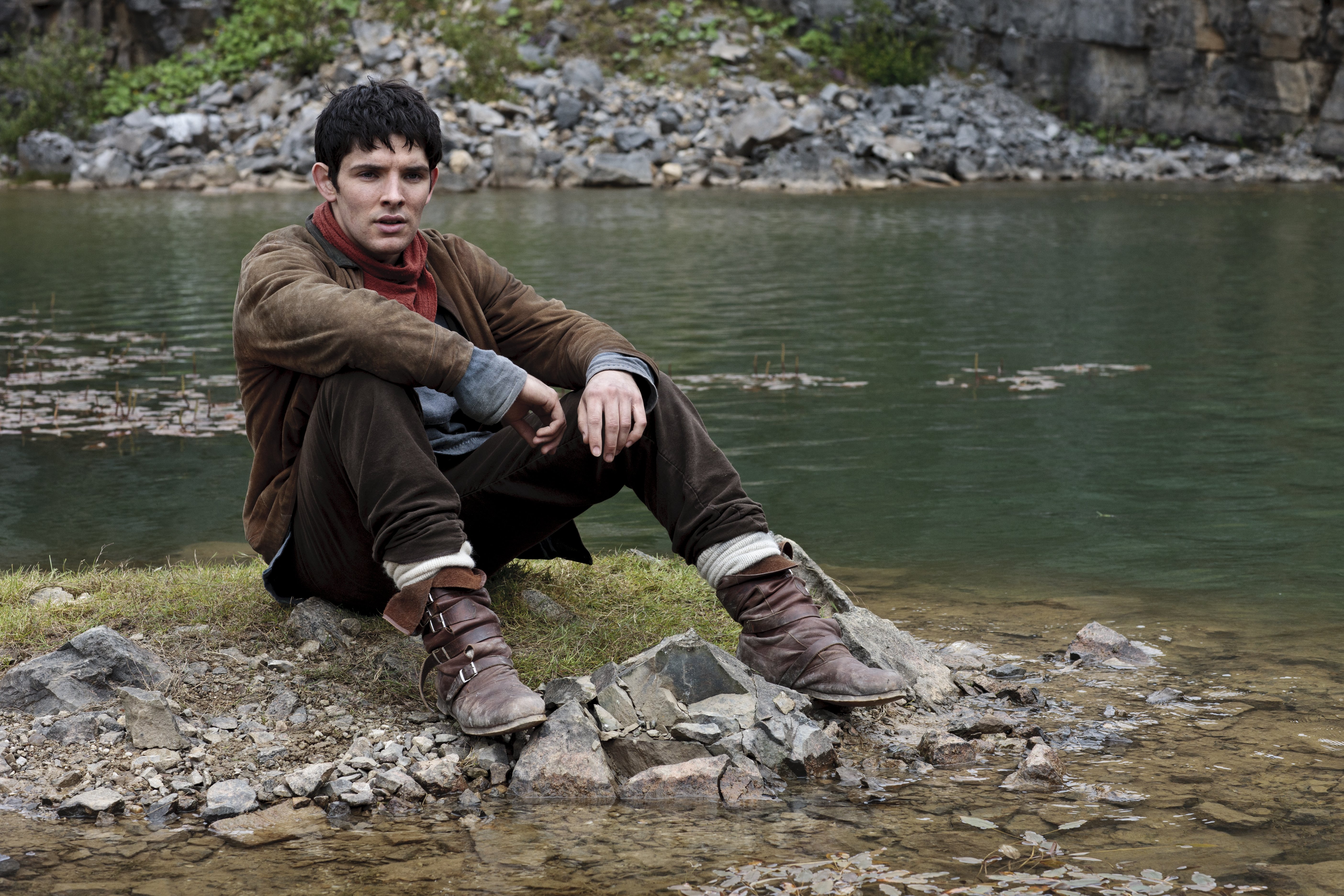 Merlin from Merlin sitting by a lake HD Wallpaper