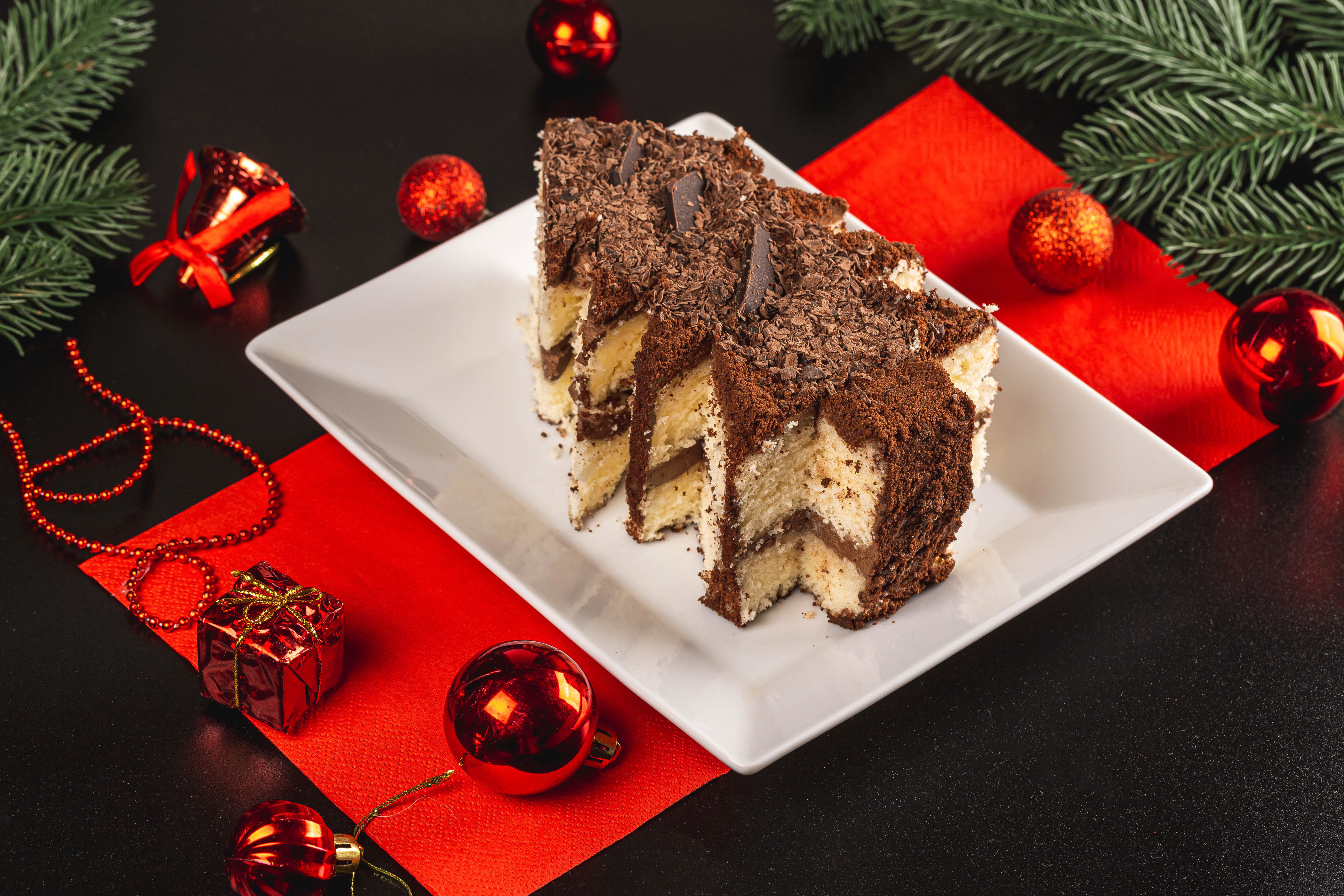 Chocolate cake slices with Christmas decorations HD Wallpaper