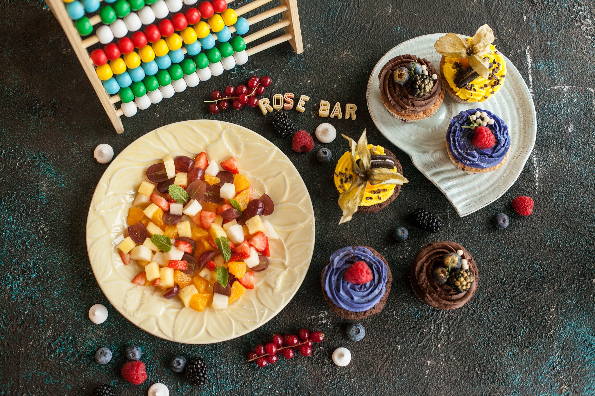 Dessert and fruit salad with abacus HD Wallpaper