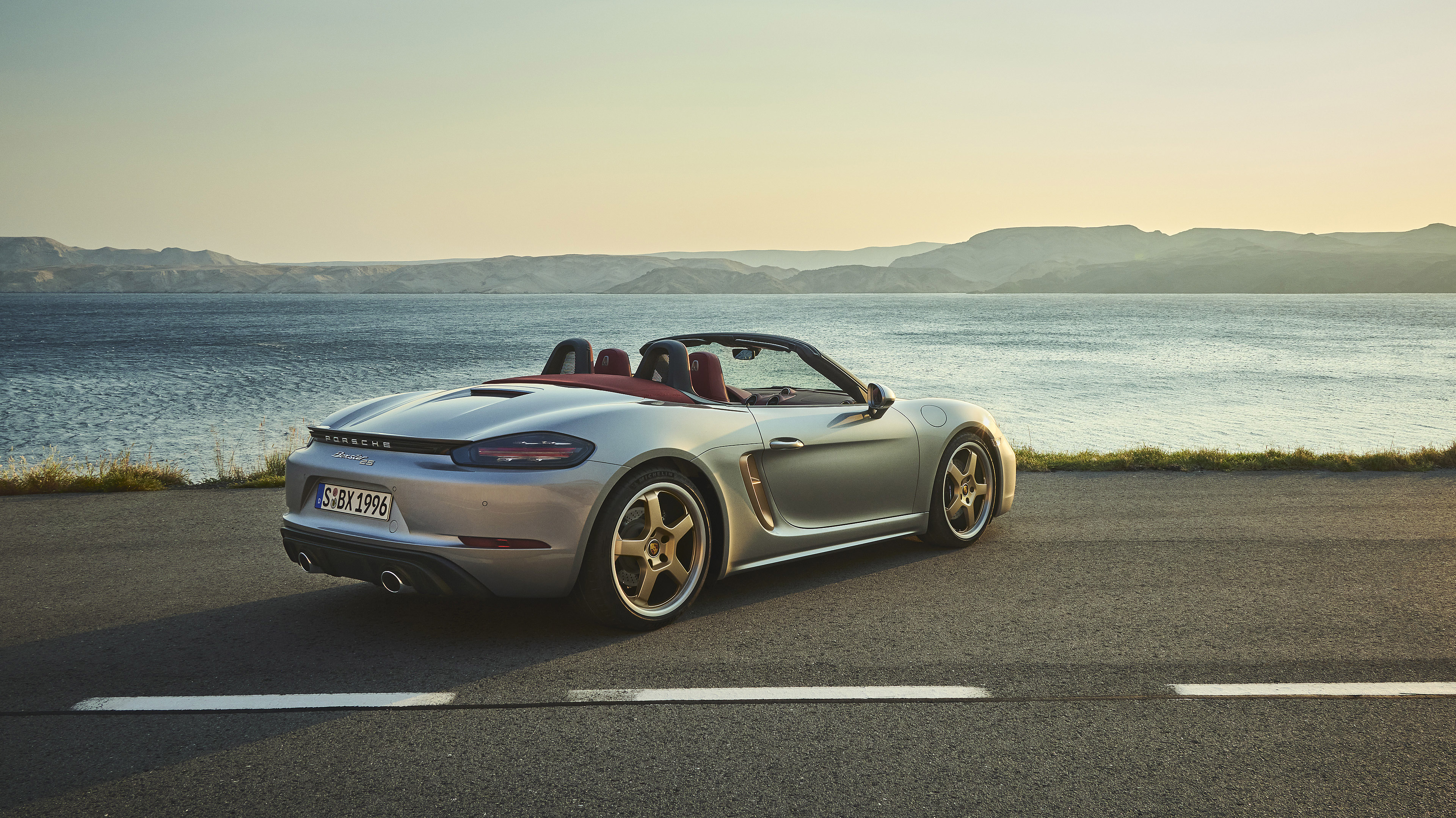 Silver Porsche Boxster Convertible on Road by Lake HD Wallpaper