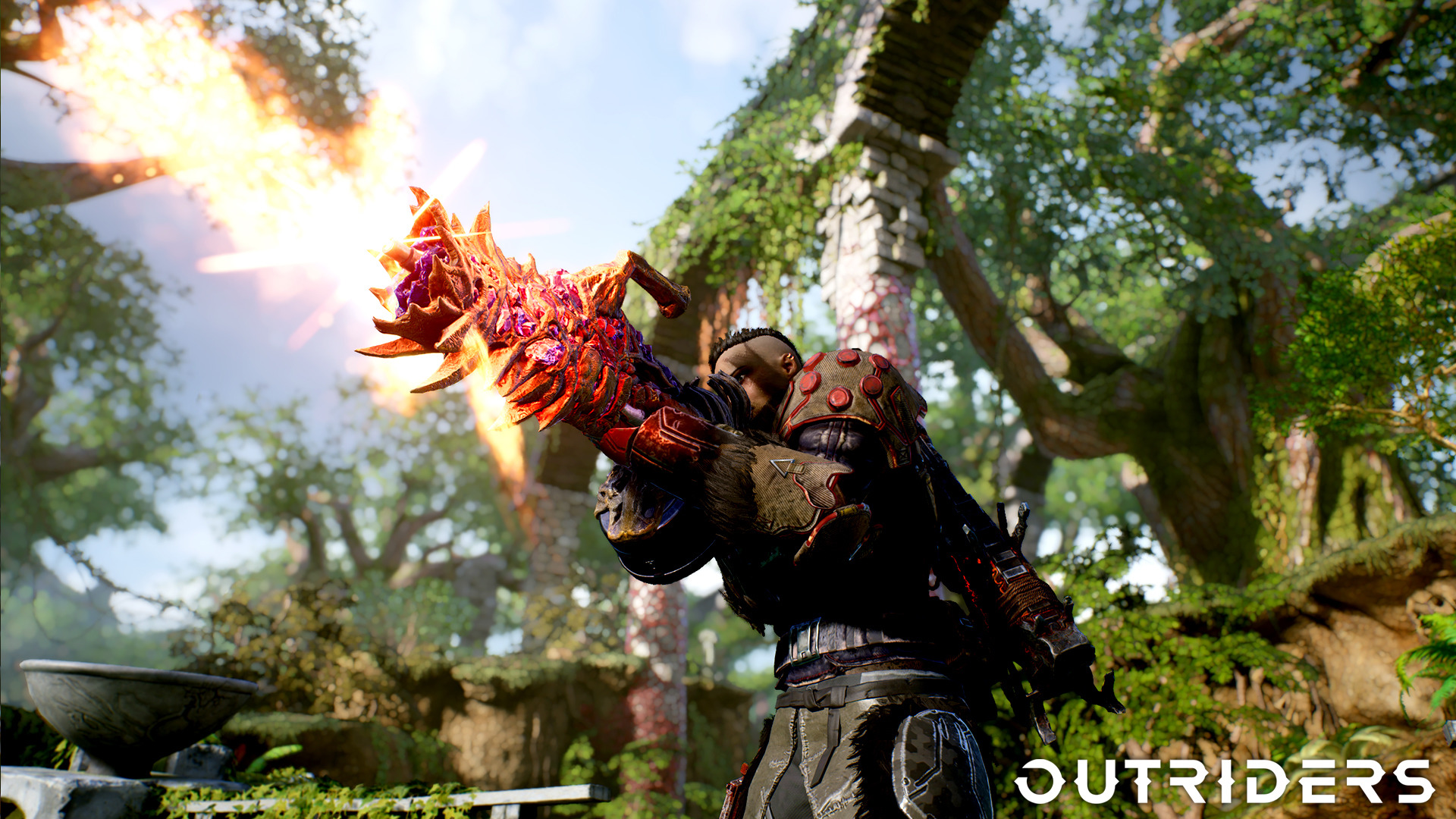 Outriders character firing a weapon in a forest HD Wallpaper