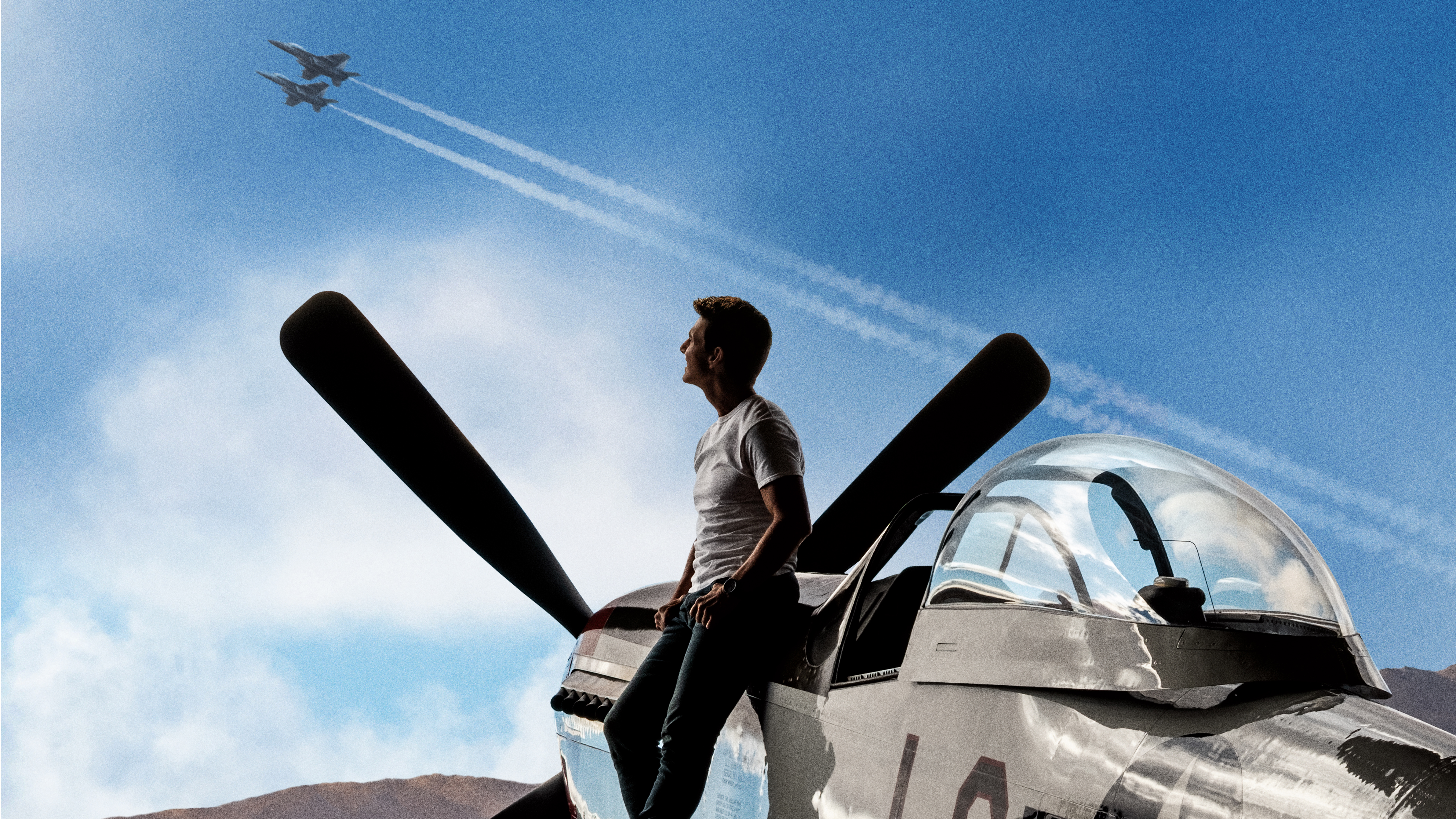 Tom Cruise on a vintage airplane HD Wallpaper