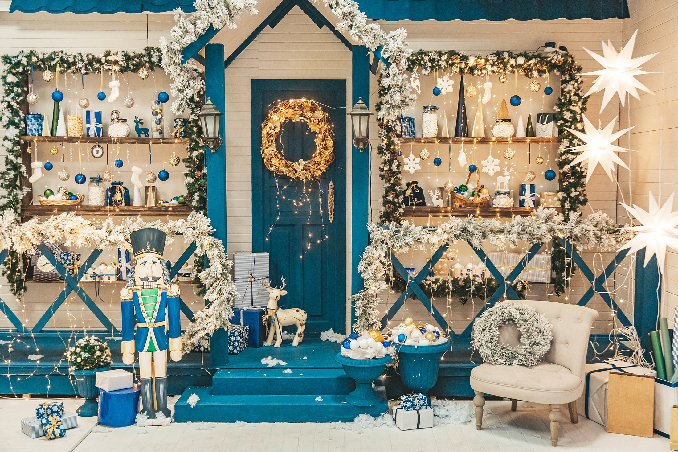 Christmas decorated porch with nutcracker and deer HD Wallpaper
