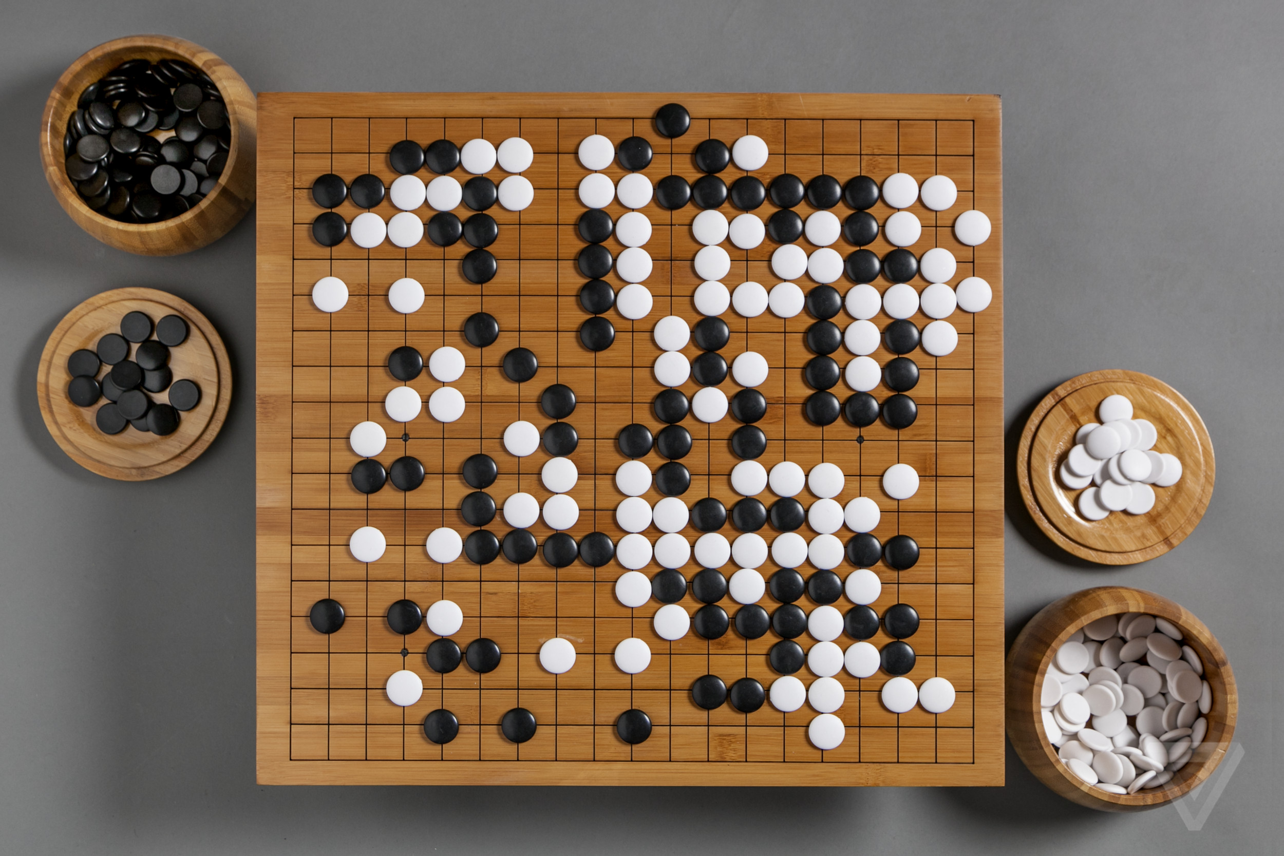 Go board game with black and white stones HD Wallpaper