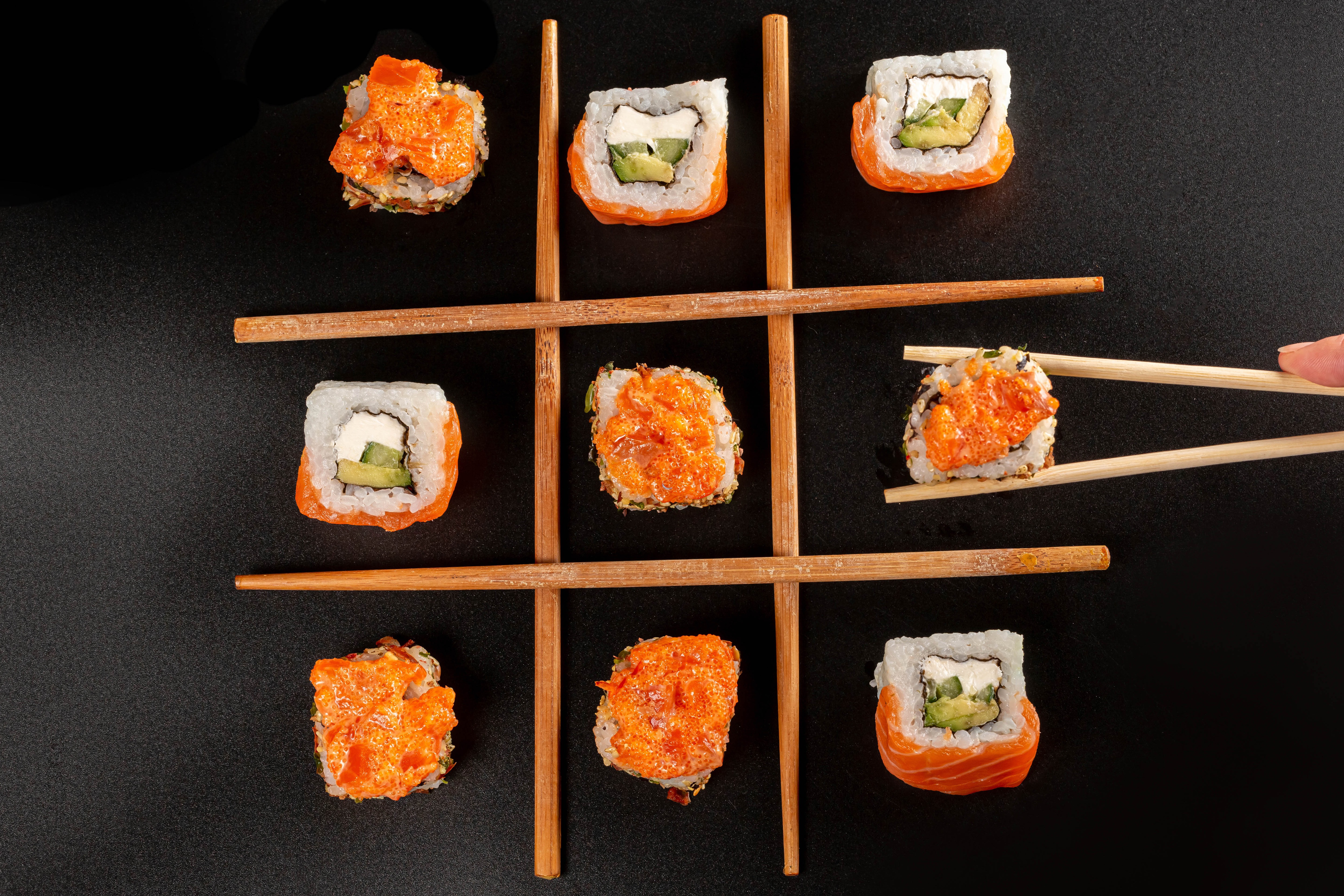 Sushi tic-tac-toe game with chopsticks HD Wallpaper