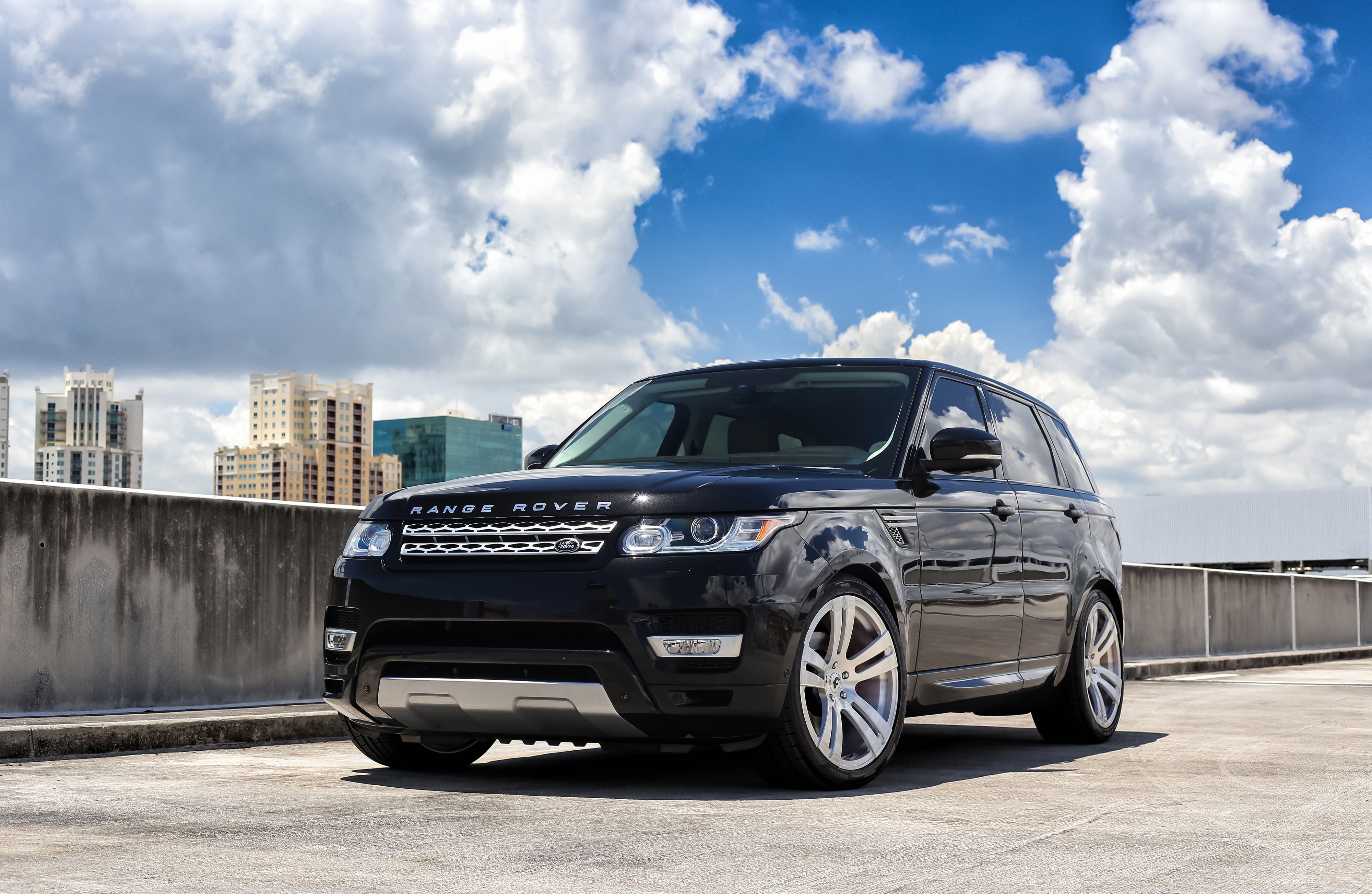 Black Range Rover Sport on a rooftop HD Wallpaper