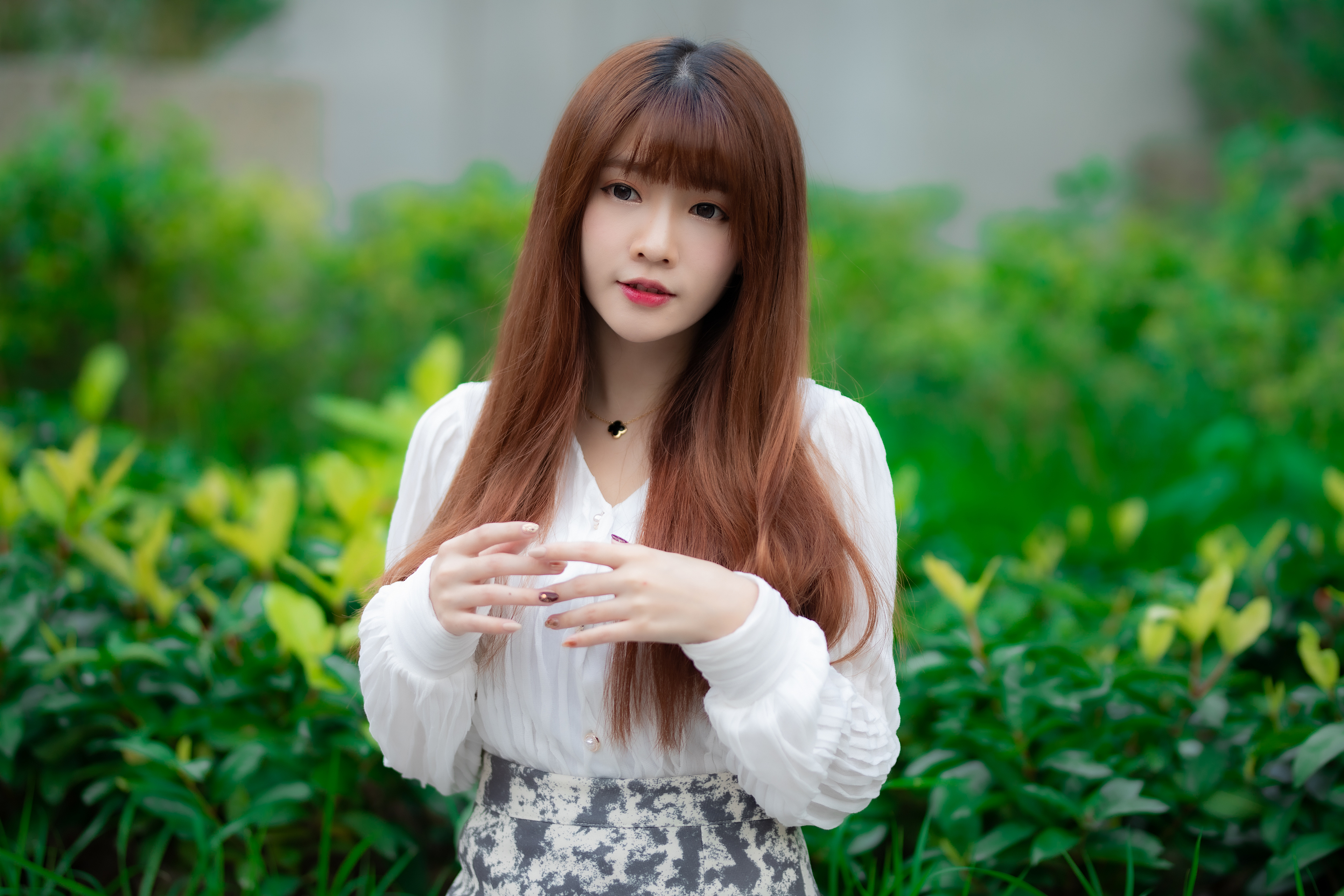 Asian woman with long brown hair and white shirt HD Wallpaper