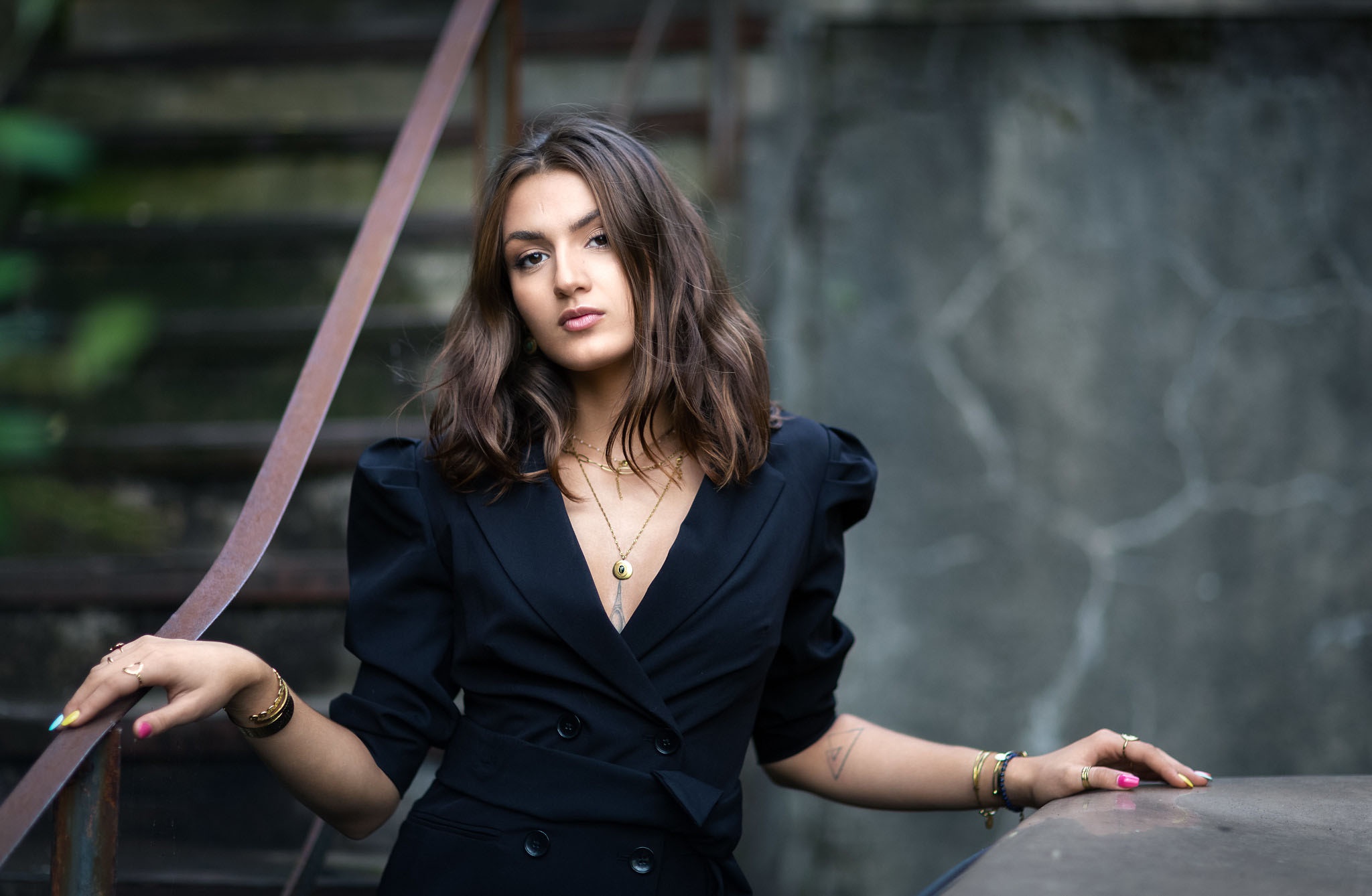 Woman with dark hair wearing a black blazer HD Wallpaper