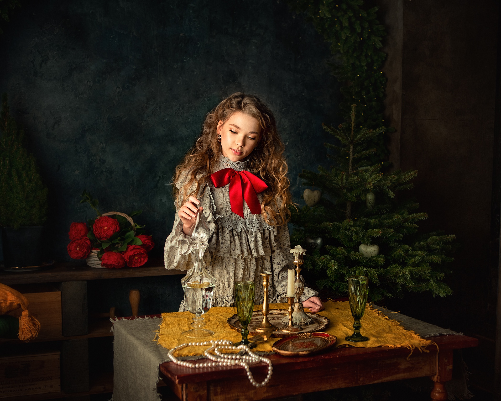 Girl in vintage dress with red bow by Christmas tree HD Wallpaper