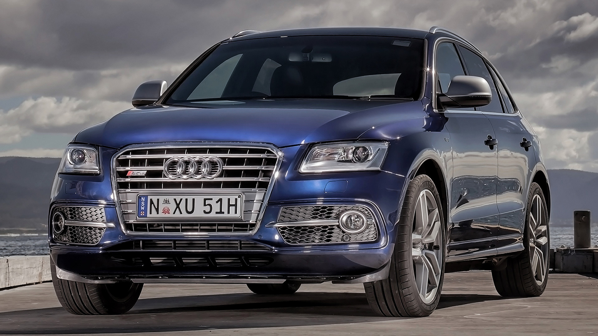 Blue Audi SQ5 TDI parked on a pier HD Wallpaper