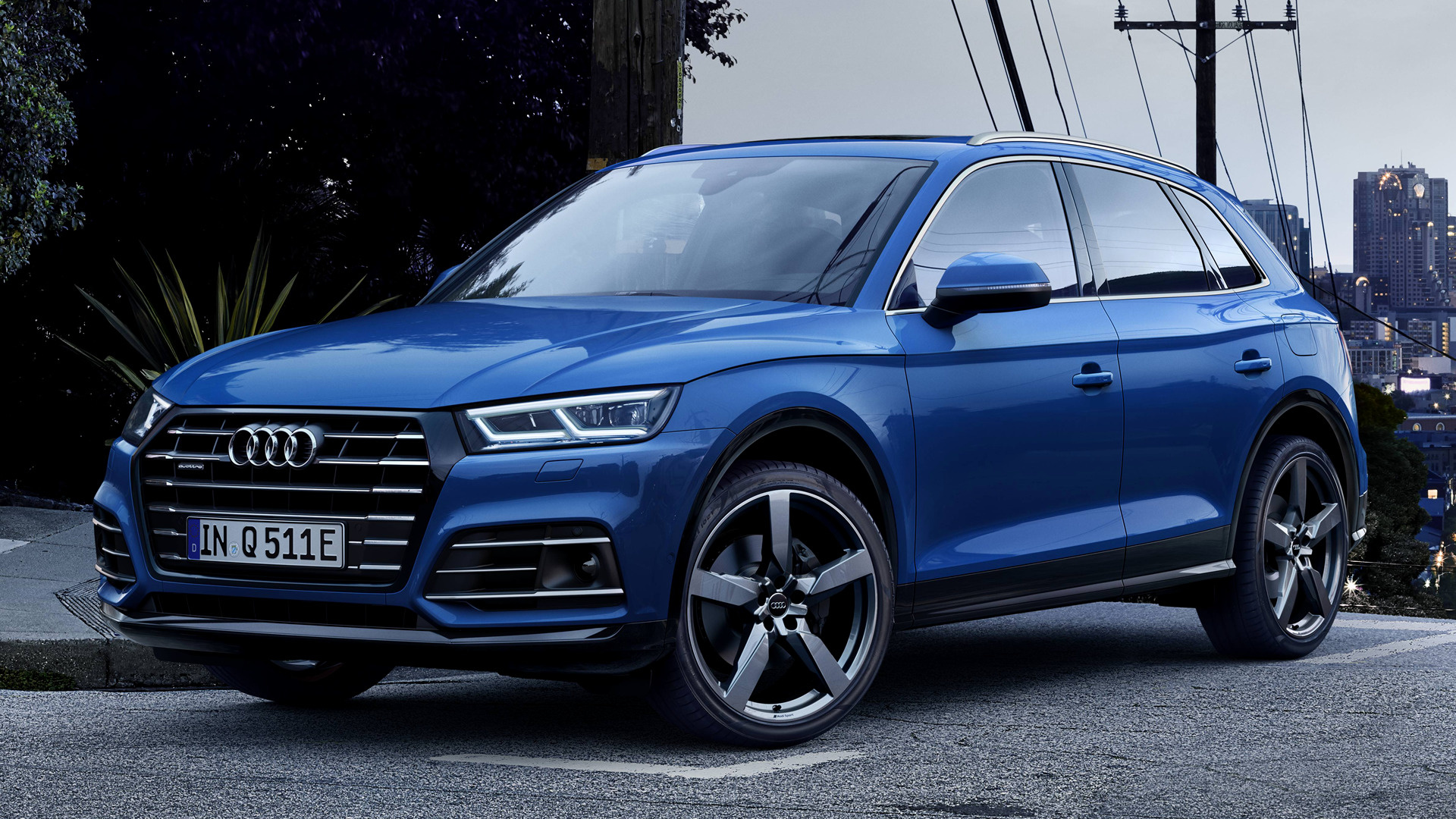 Blue Audi Q5 55 TFSI Plug-In Hybrid S Line parked on street HD Wallpaper