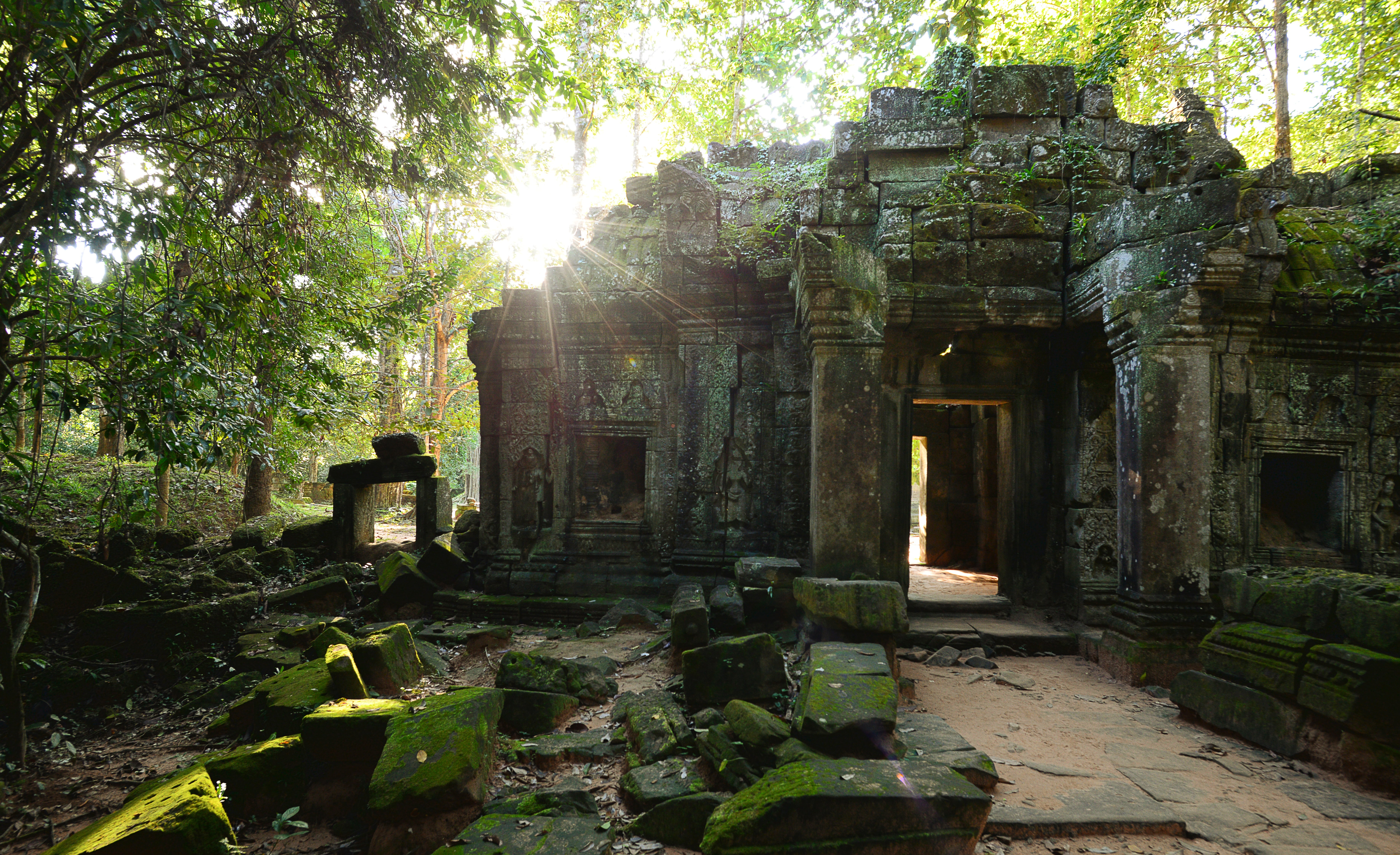 Ancient Stone Ruins Covered in Moss in Cambodia HD Wallpaper