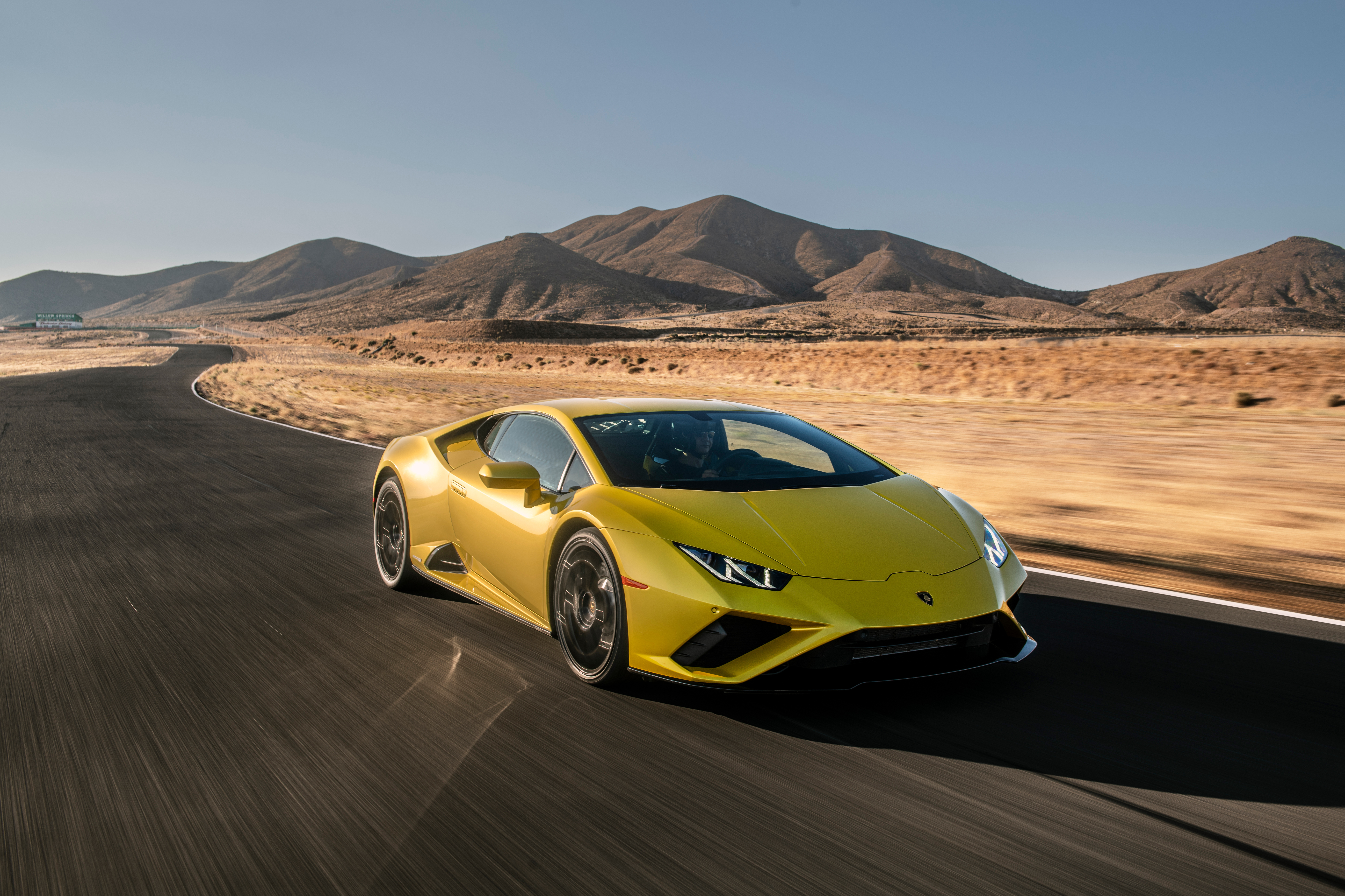 Yellow Lamborghini Huracan on a Desert Race Track HD Wallpaper