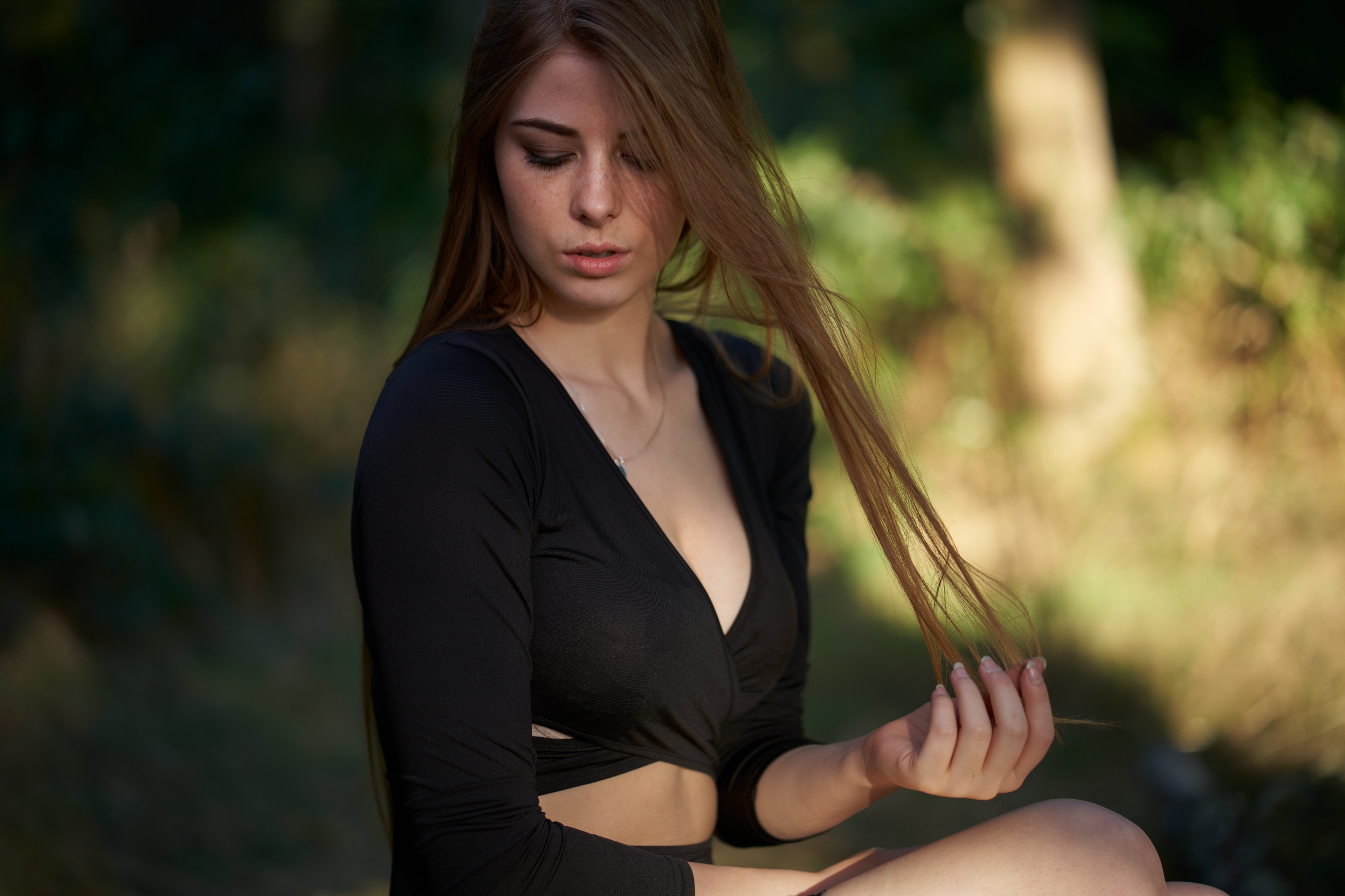 Woman with long hair in black top HD Wallpaper