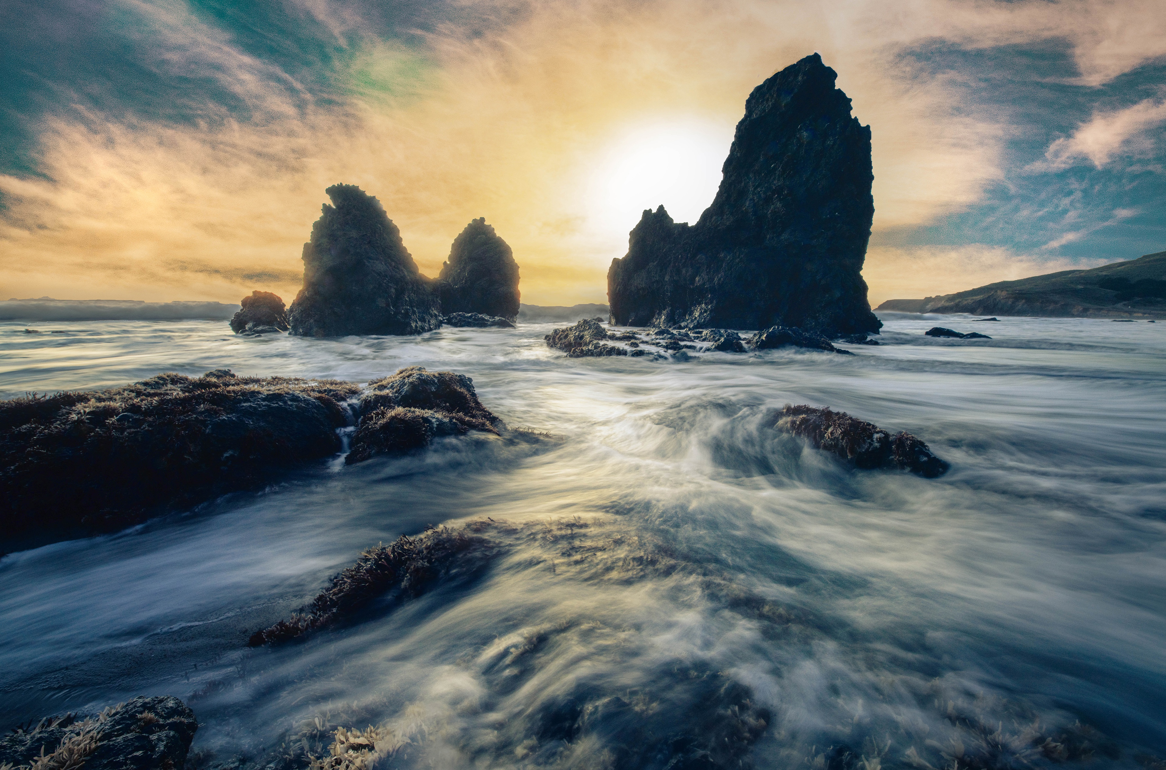 Seashore with rocks and waves at sunset 4K HD Wallpaper