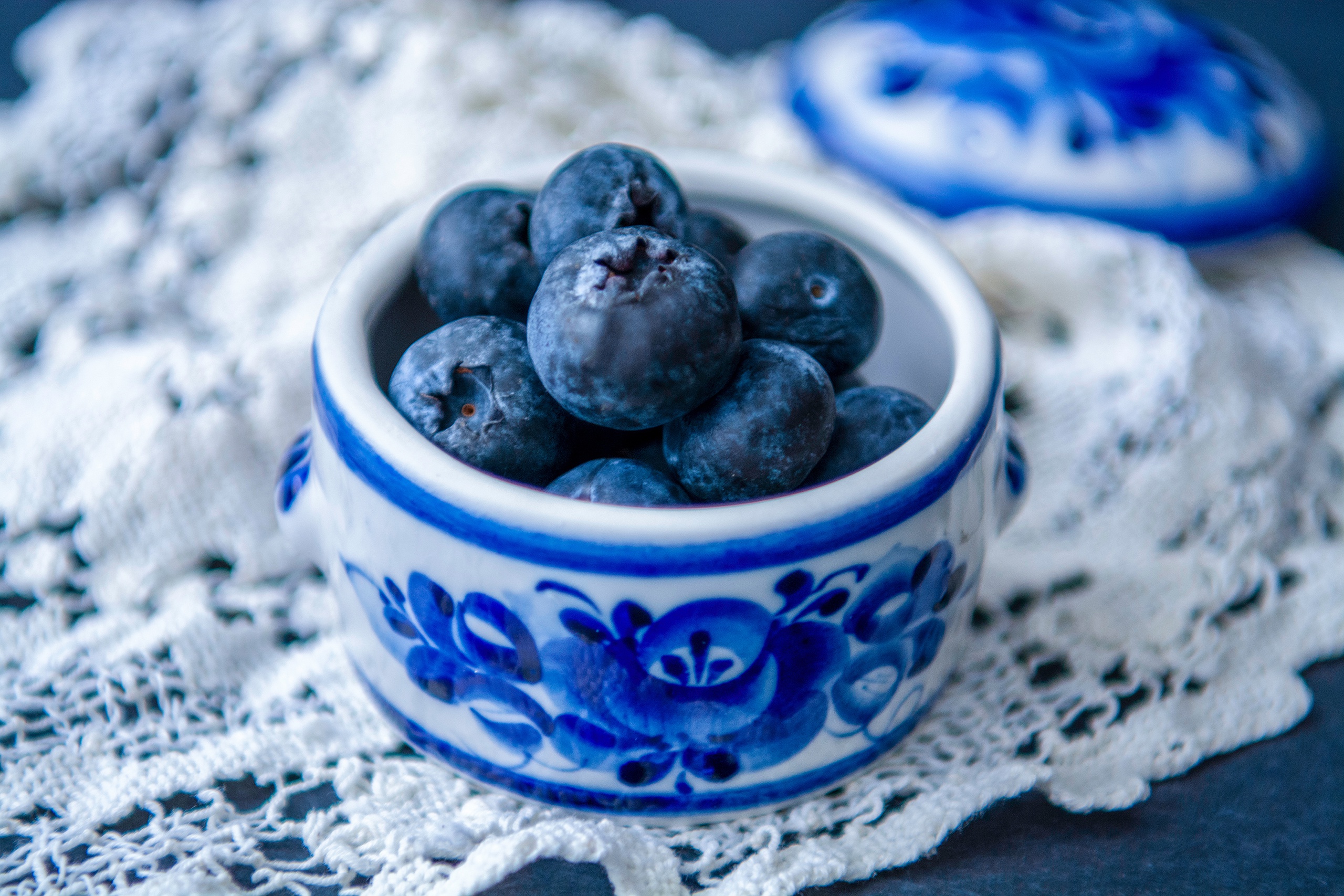 Blueberries in a decorative bowl HD Wallpaper