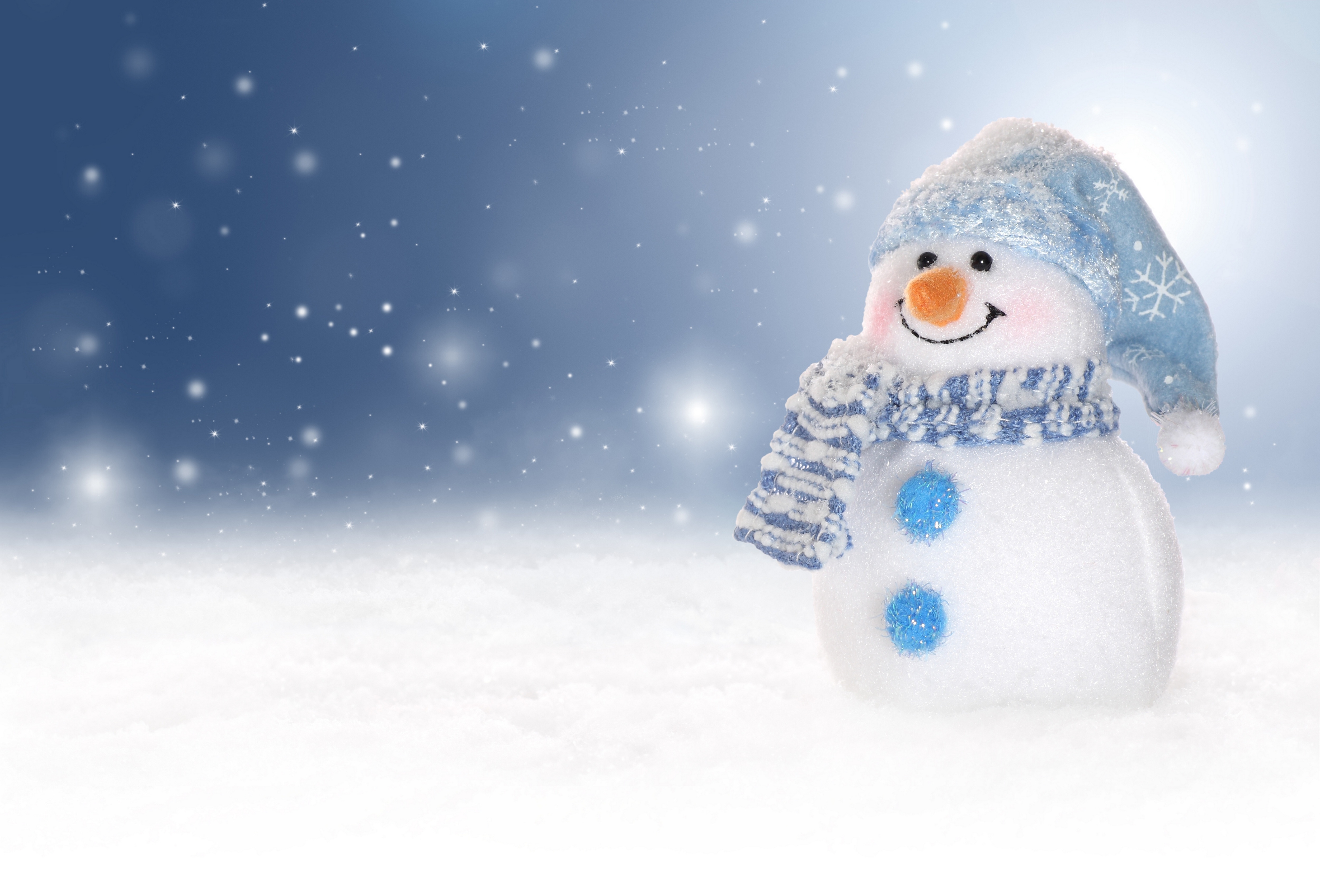 Snowman with blue hat and scarf in snow HD Wallpaper