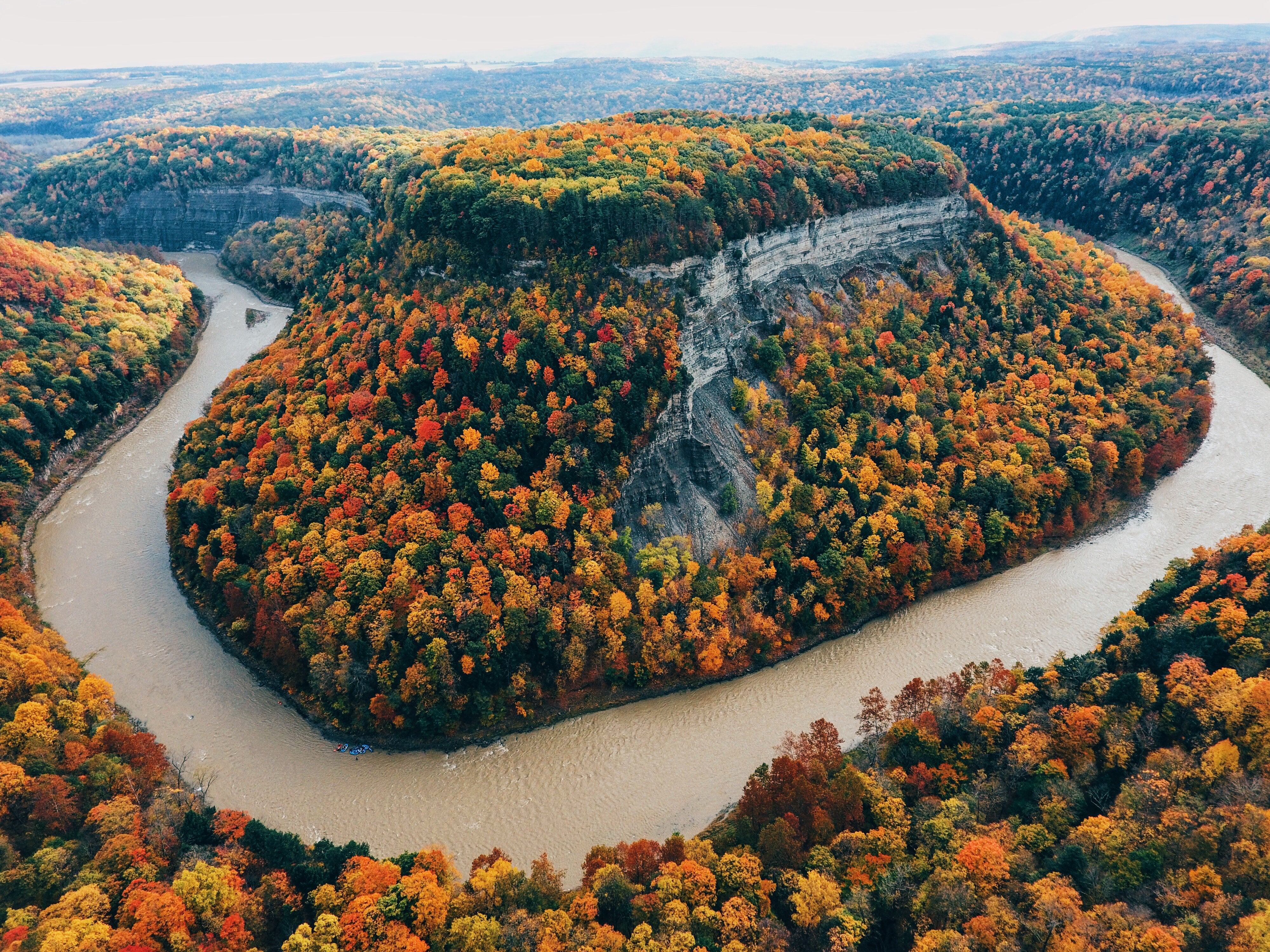Autumn foliage along a river in Letchworth State Park HD Wallpaper