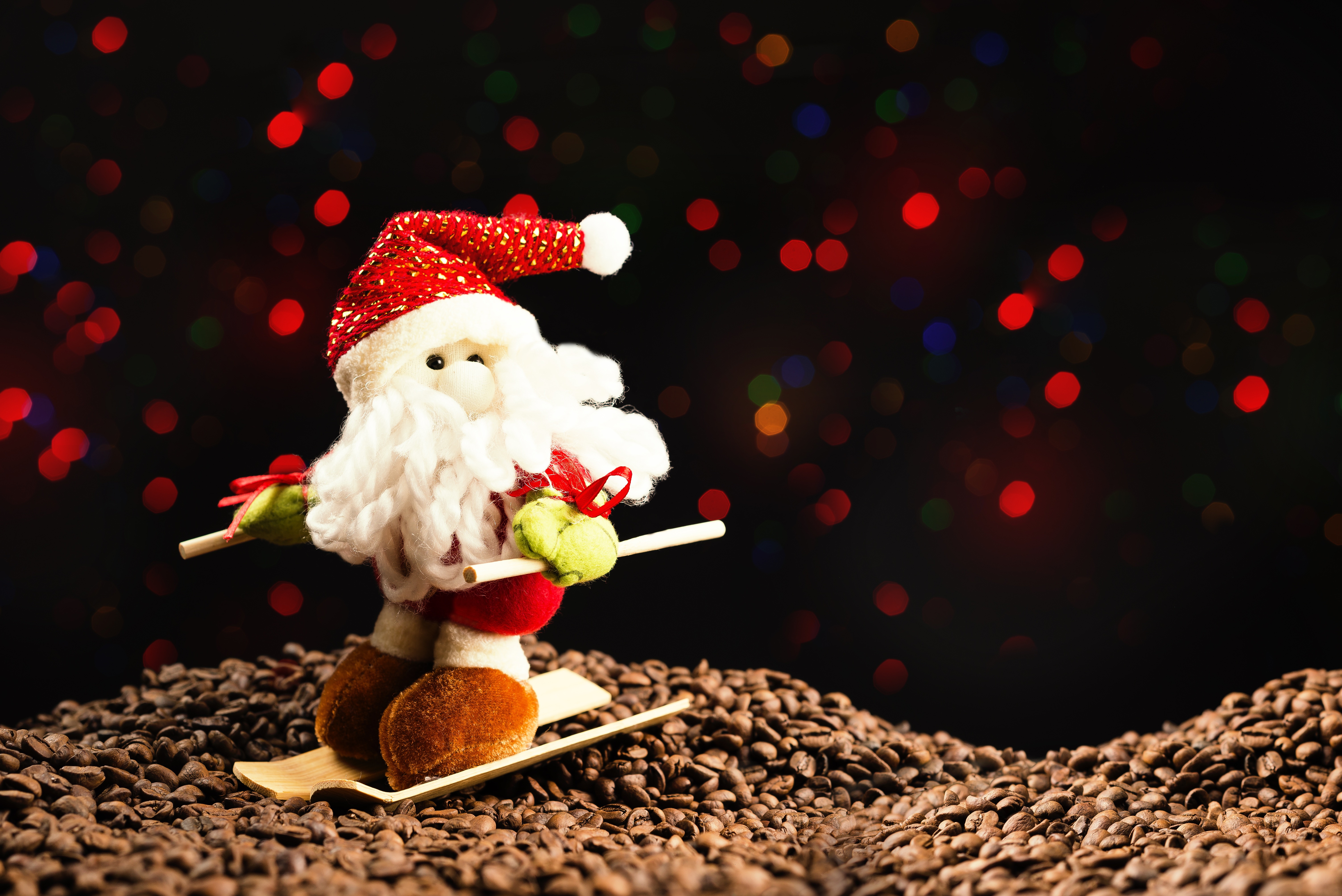 Santa Claus skiing on coffee beans with bokeh lights HD Wallpaper