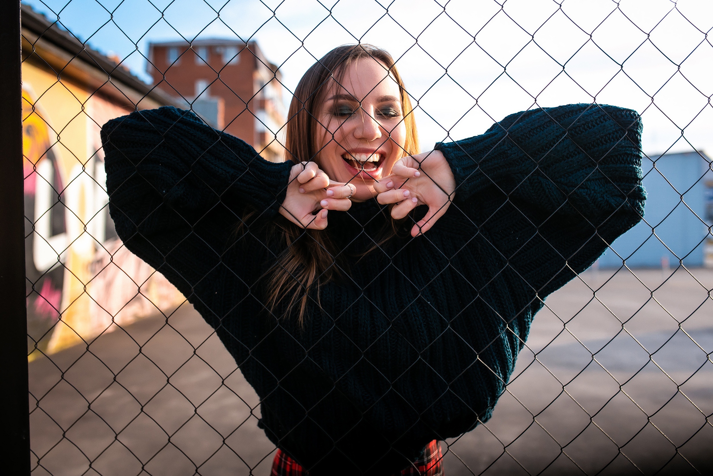 Woman behind a fence HD Wallpaper