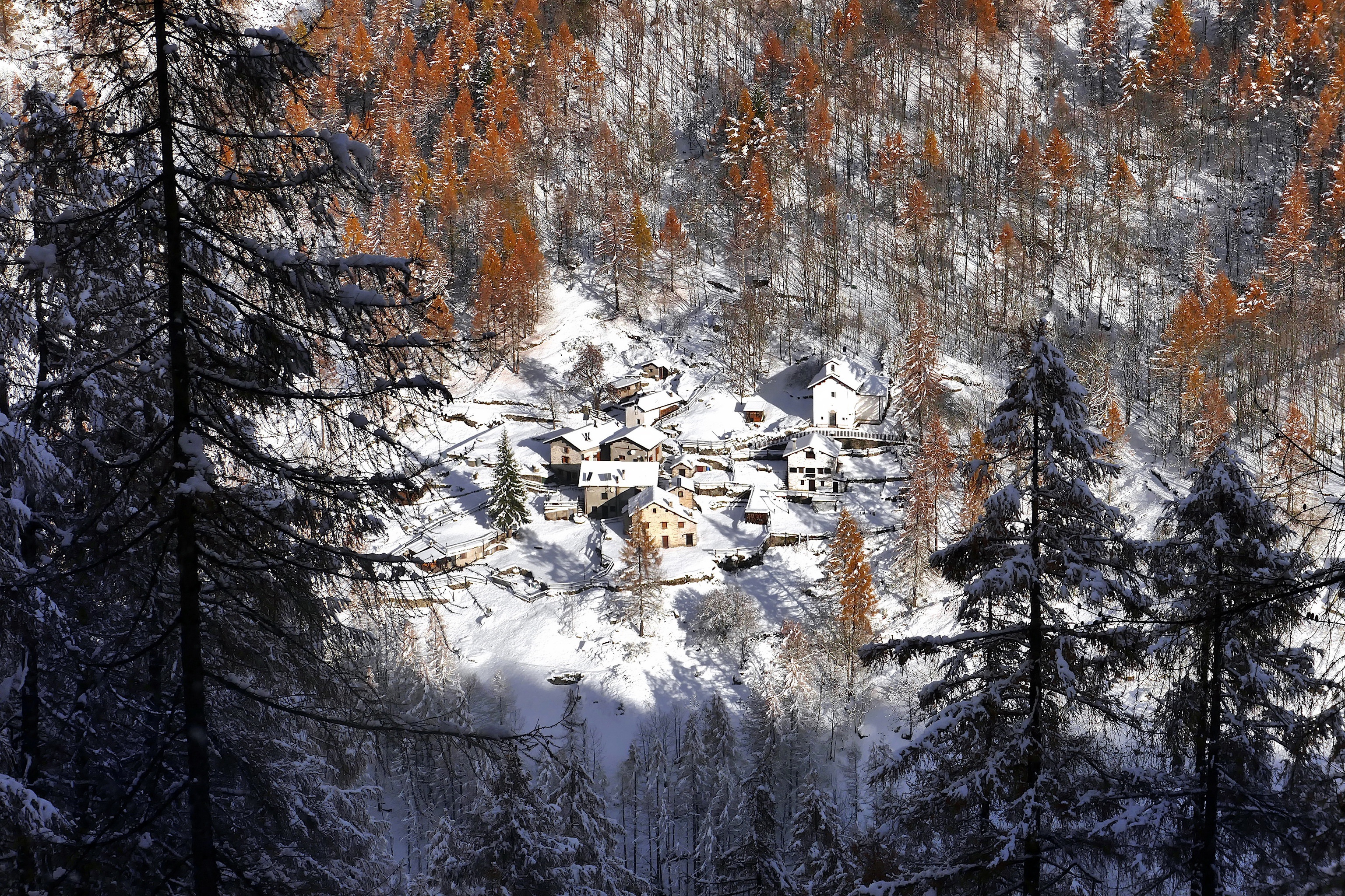 Snowy Italian Village in a Forest HD Wallpaper