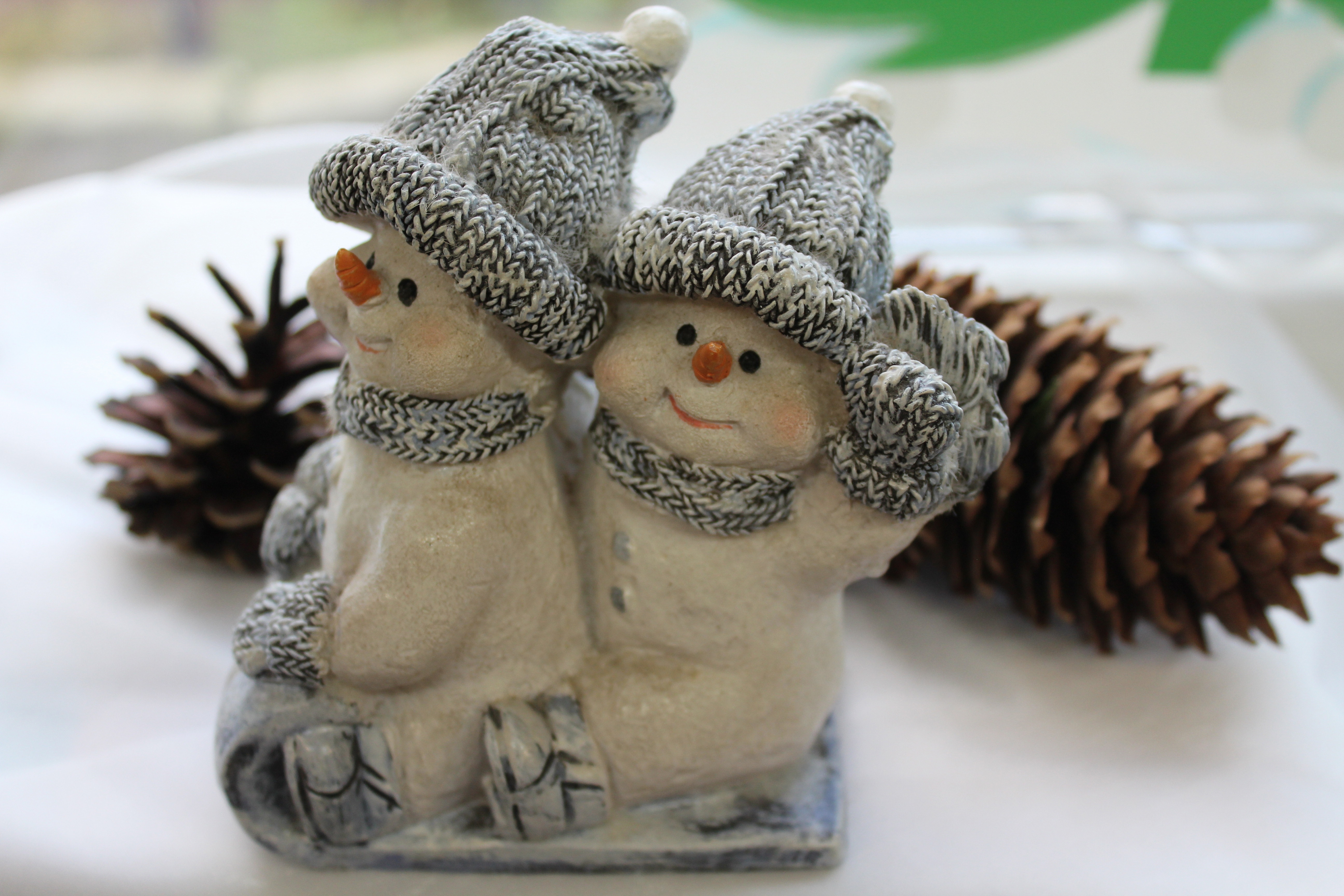 Christmas Snowman Figurine with Pine Cones HD Wallpaper