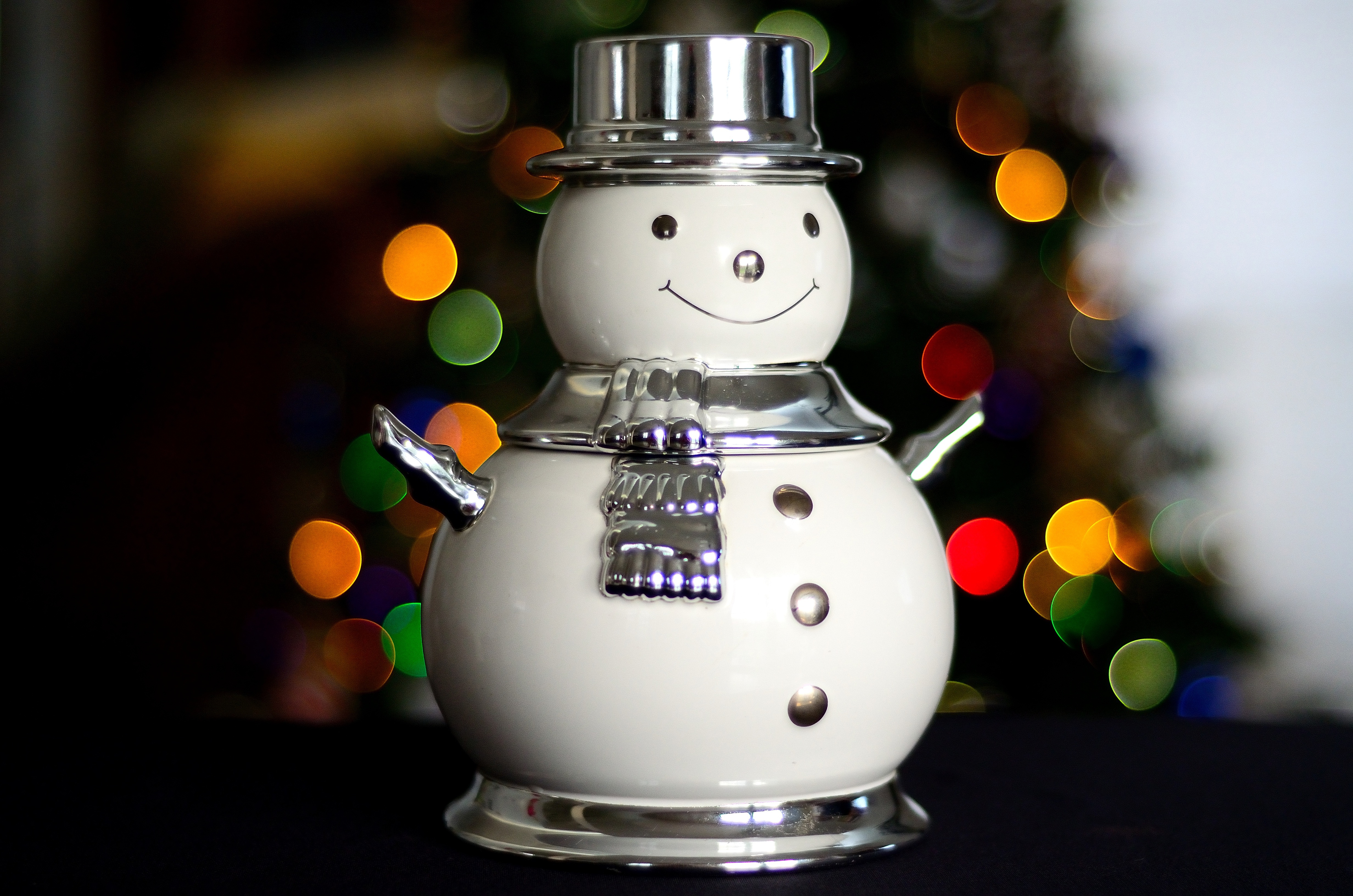 Christmas Snowman Figurine with Bokeh Lights HD Wallpaper