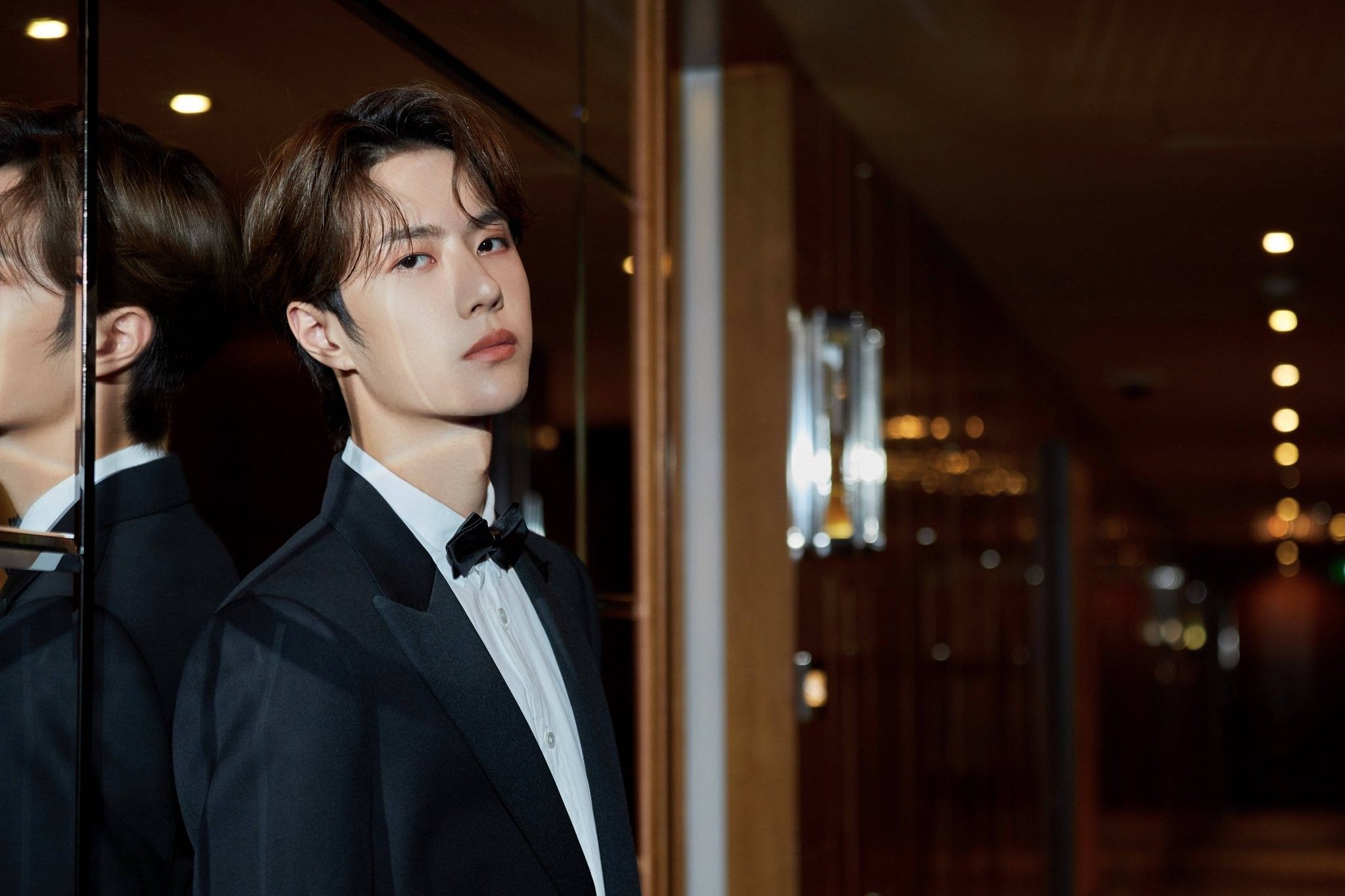 Wang Yibo in a tuxedo HD Wallpaper
