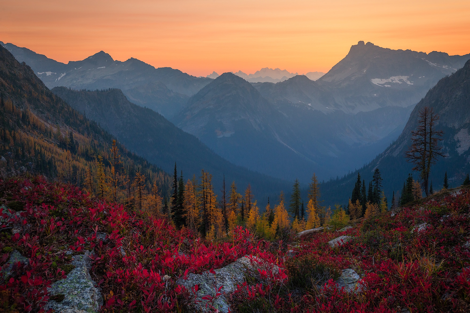 Mountain valley at sunset with autumn foliage HD Wallpaper