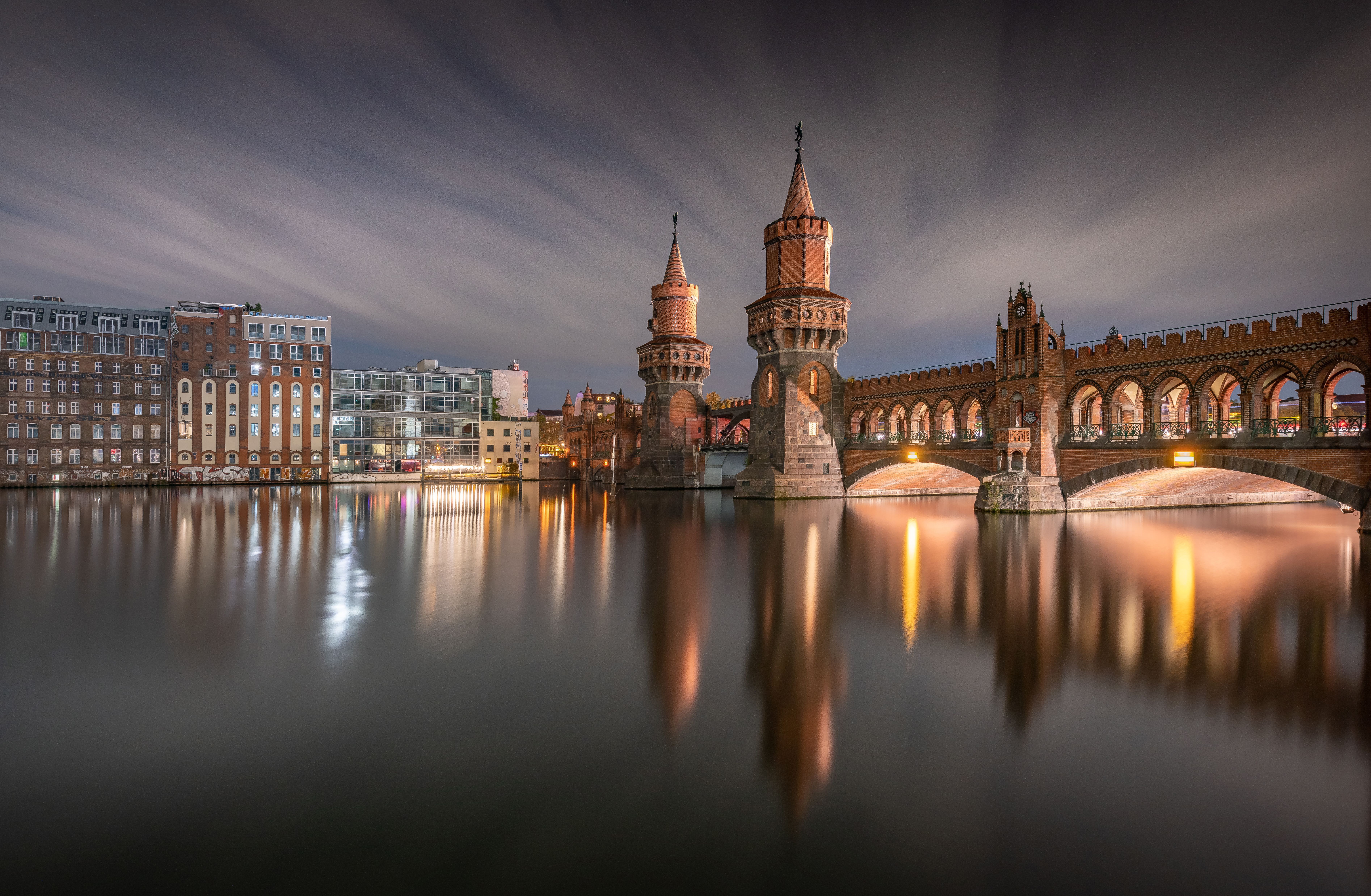 Oberbaum Bridge over Spree River in Berlin at Night 4K HD Wallpaper