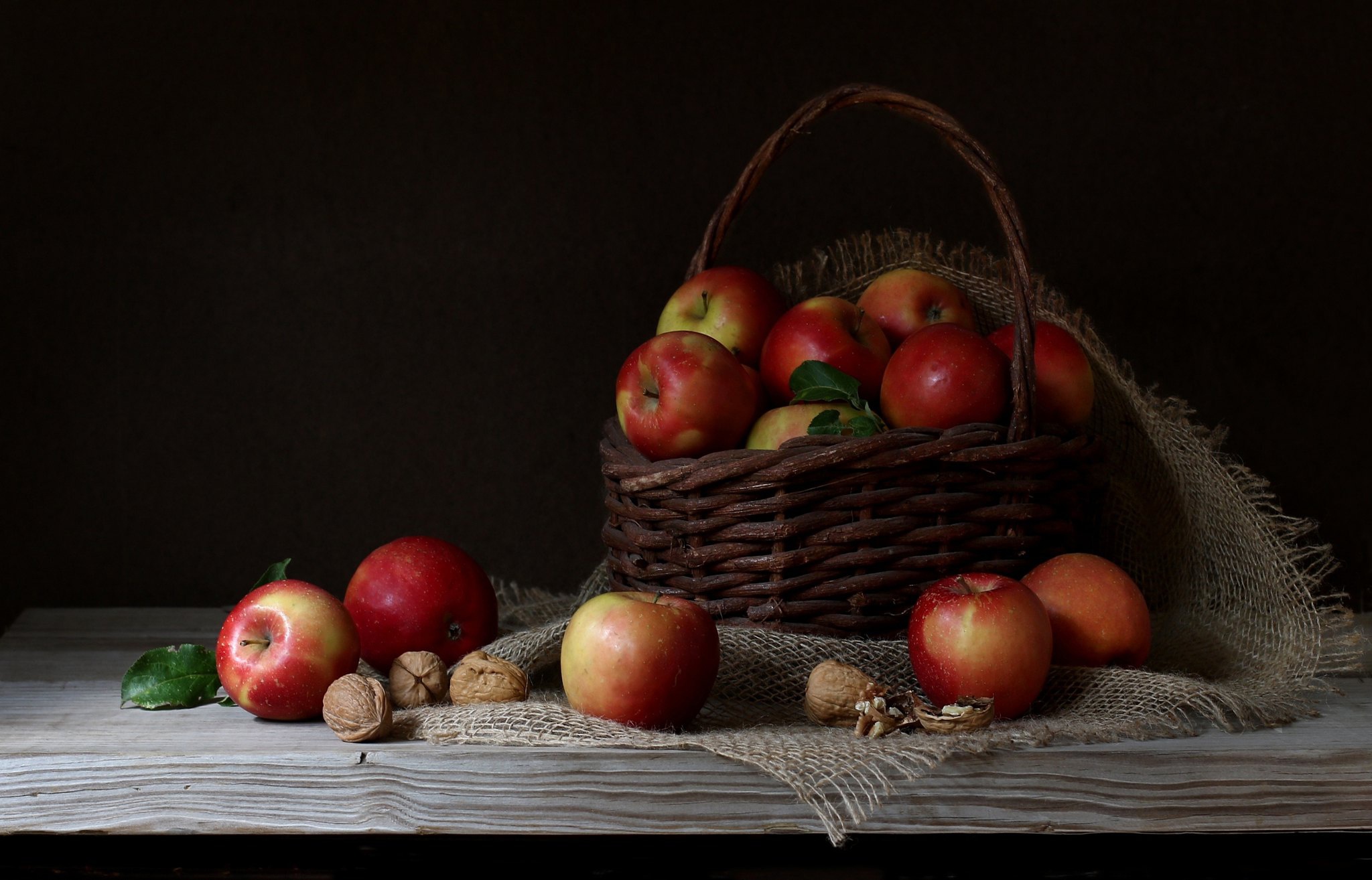 Still life with apples and walnuts in a basket HD Wallpaper