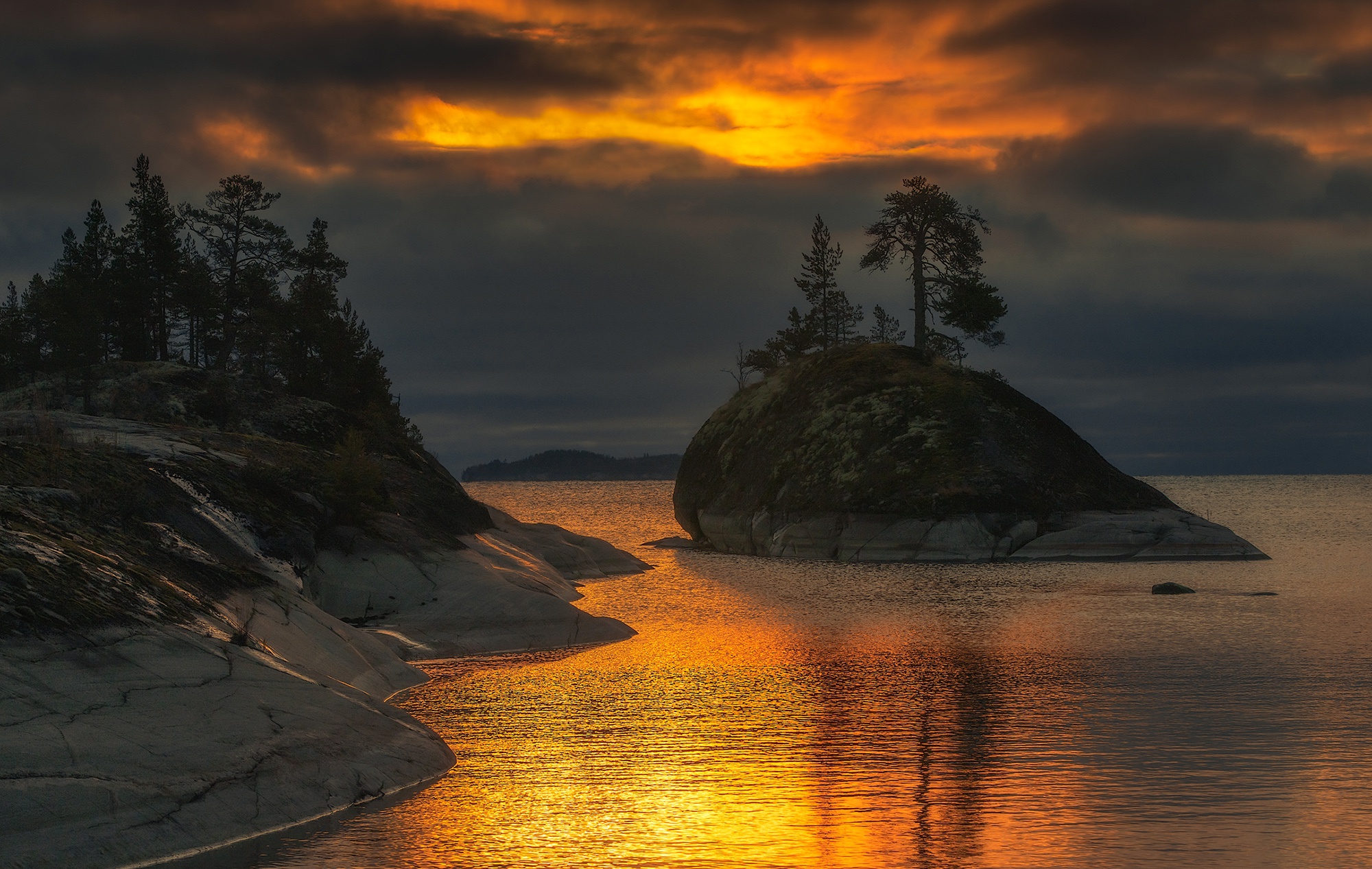 Lake with rocky islands at sunset HD Wallpaper