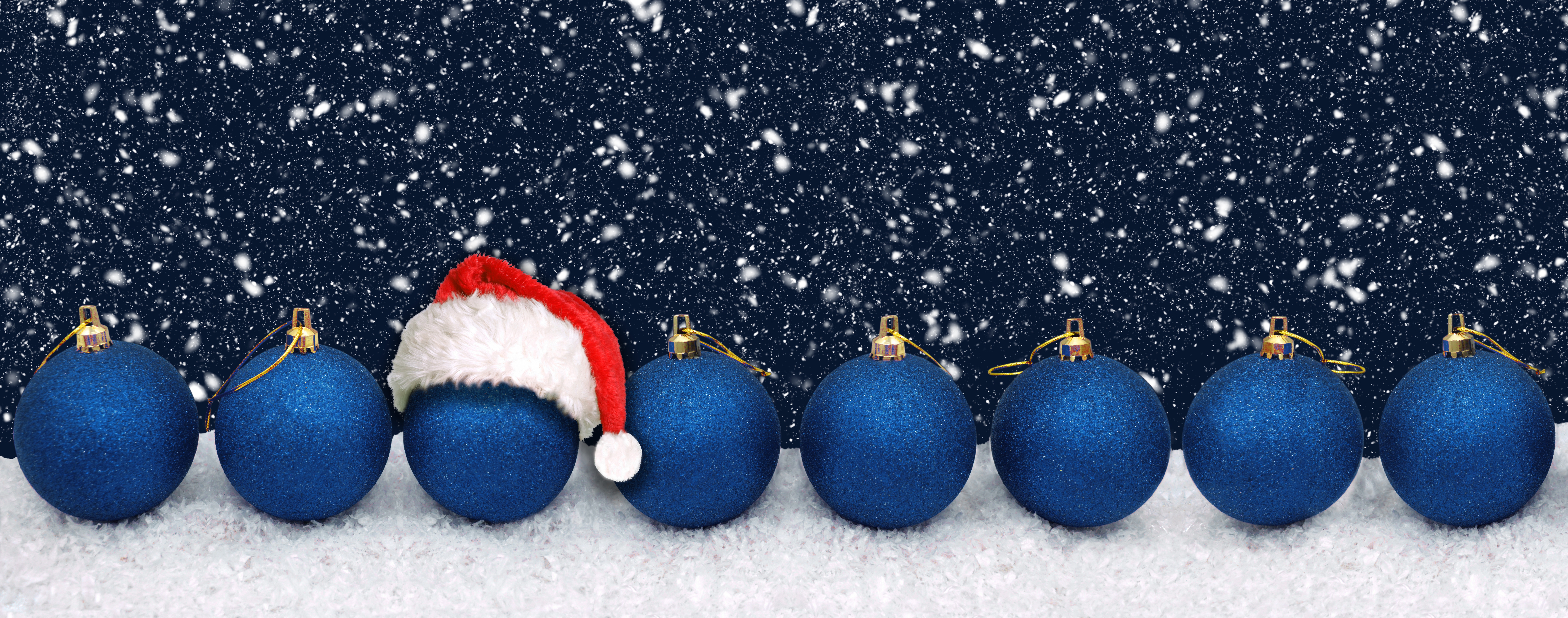Christmas Ornaments with Santa Hat and Snowfall 4K HD Wallpaper