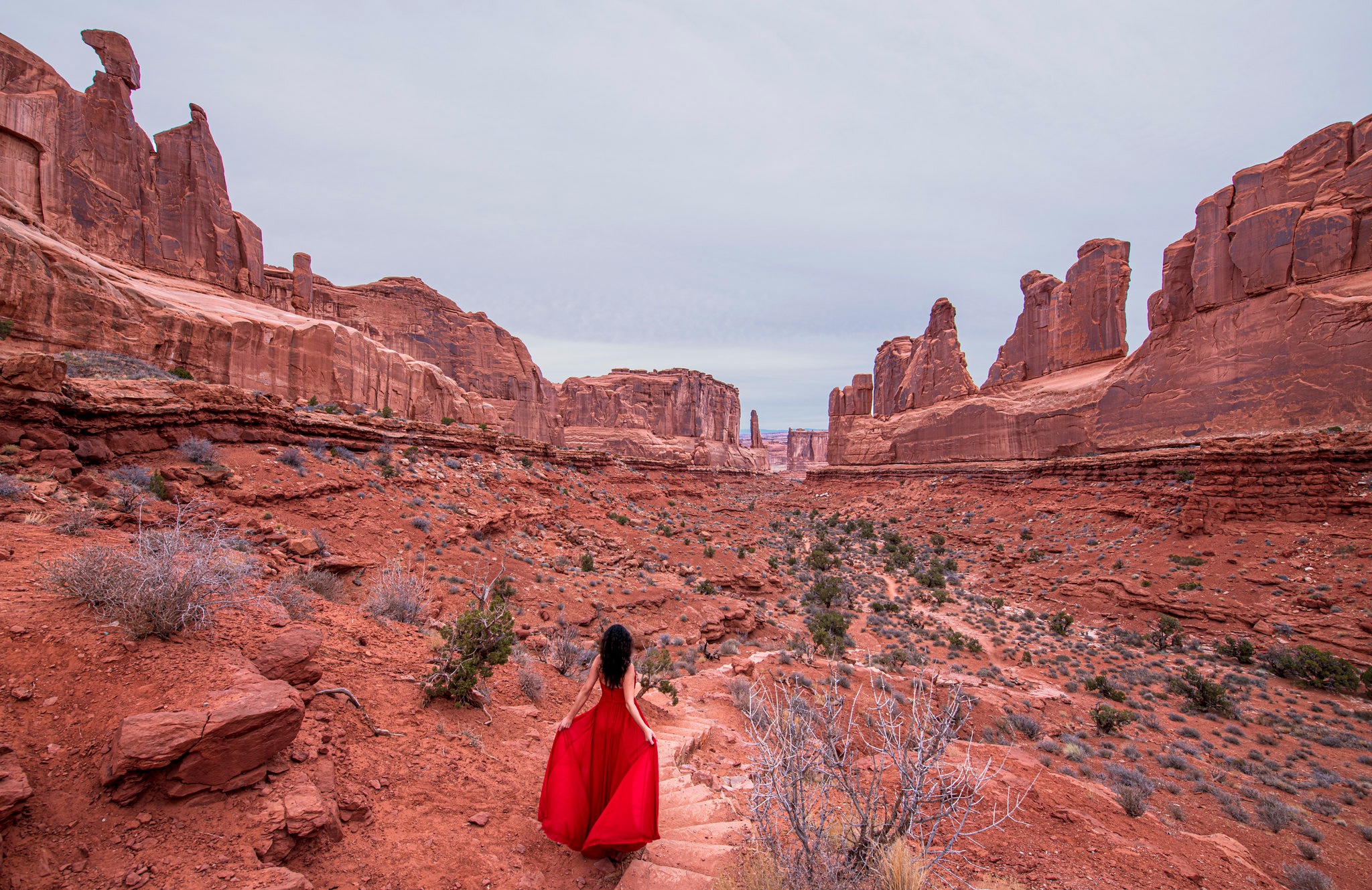 Woman in Red Dress in Arches National Park HD Wallpaper