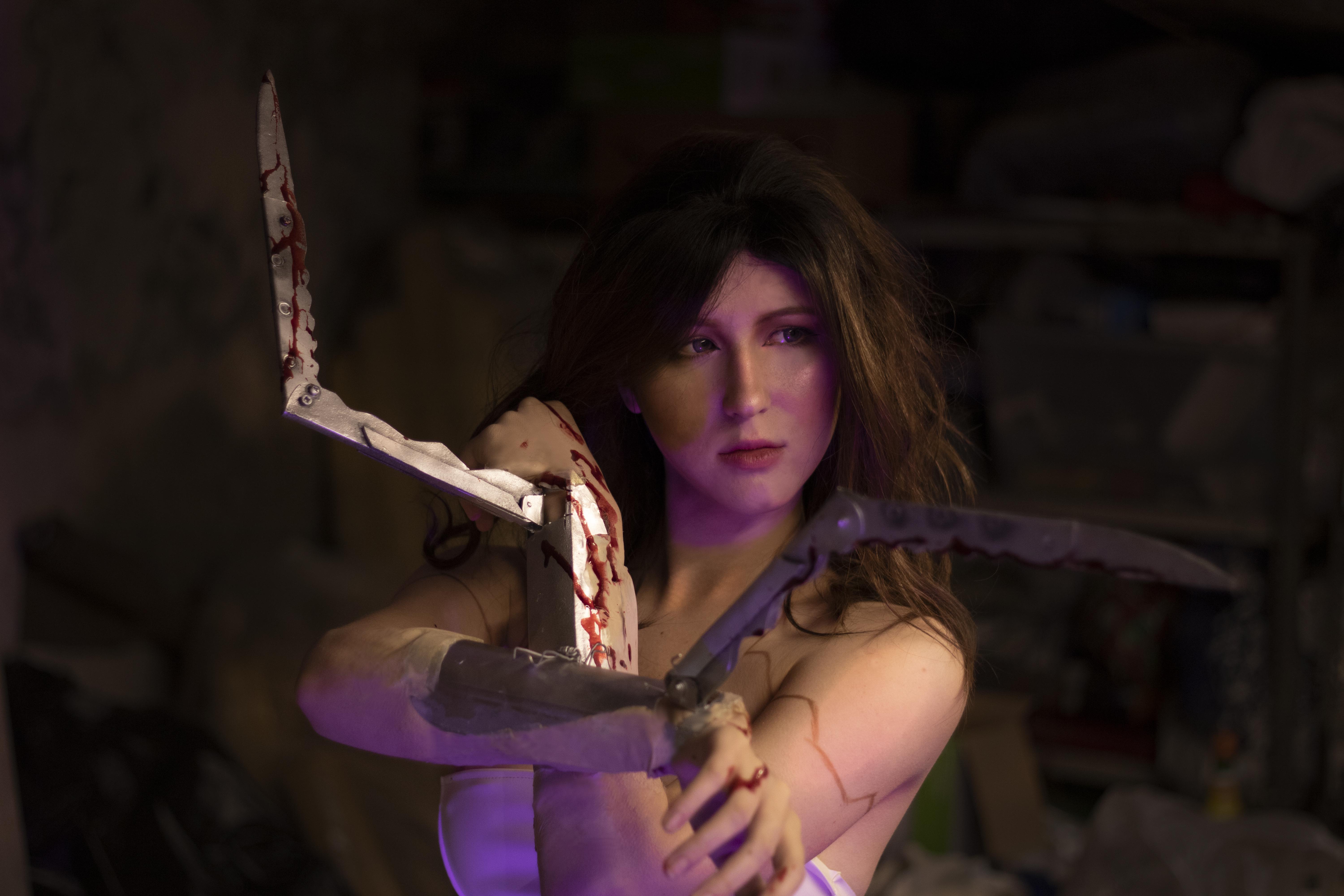 Cosplay of a woman with bloody weapons HD Wallpaper