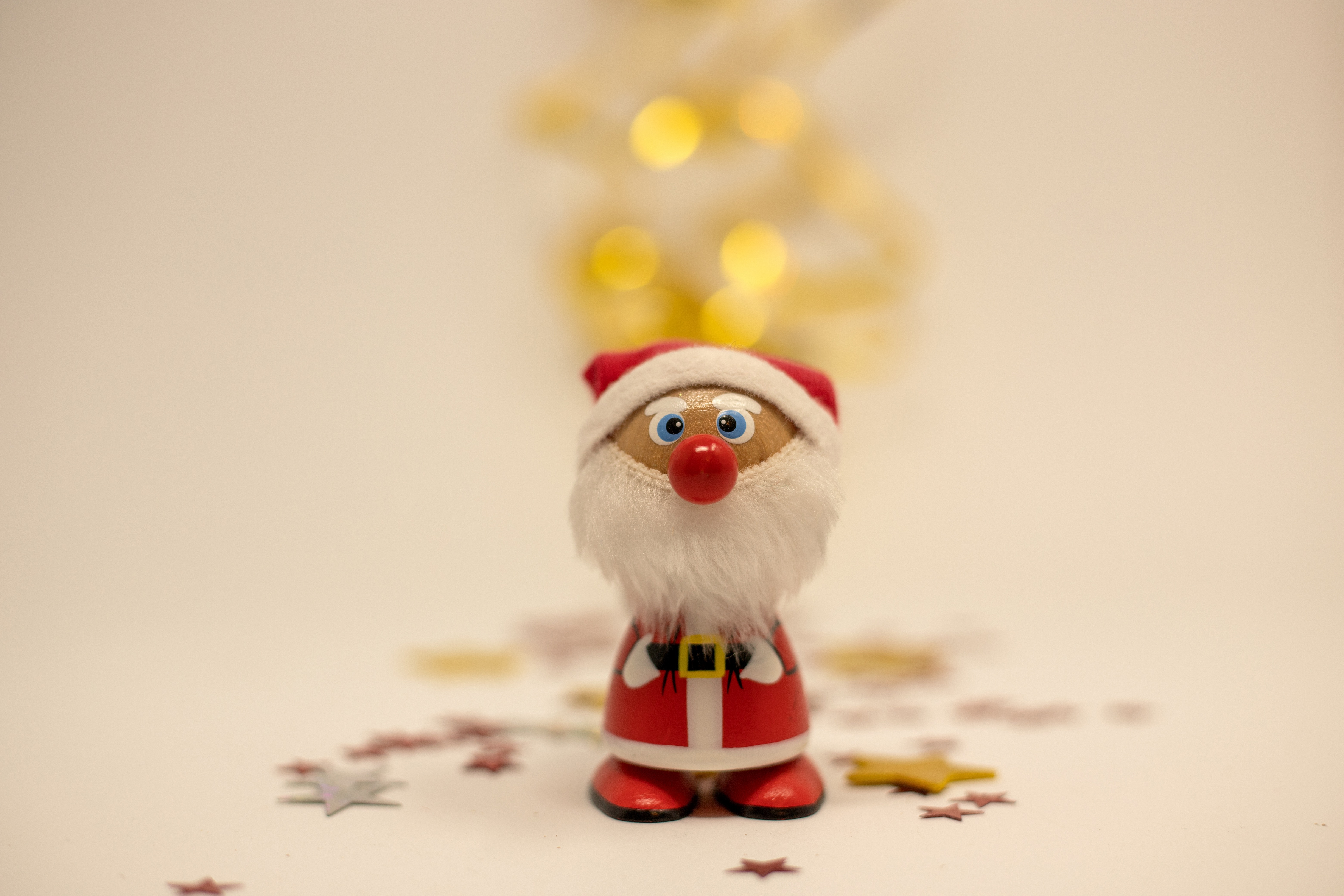 Santa Claus toy with Christmas decorations HD Wallpaper