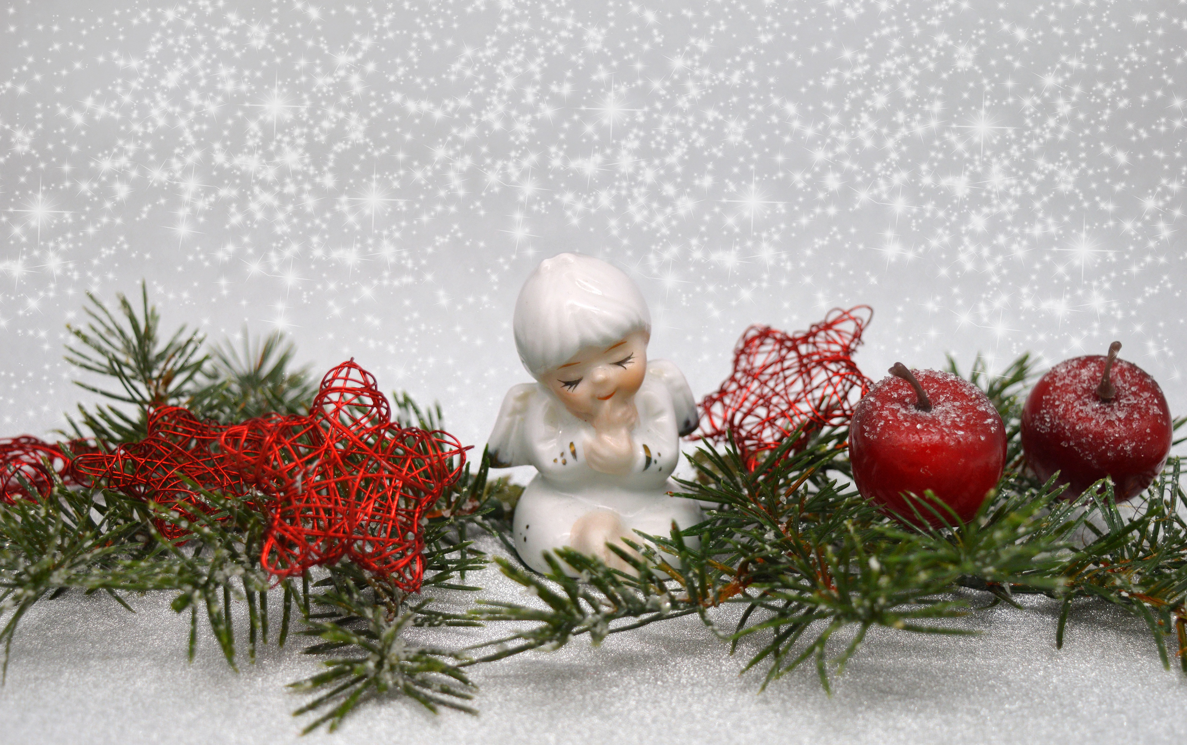 Christmas angel figurine with pine branches and apples HD Wallpaper