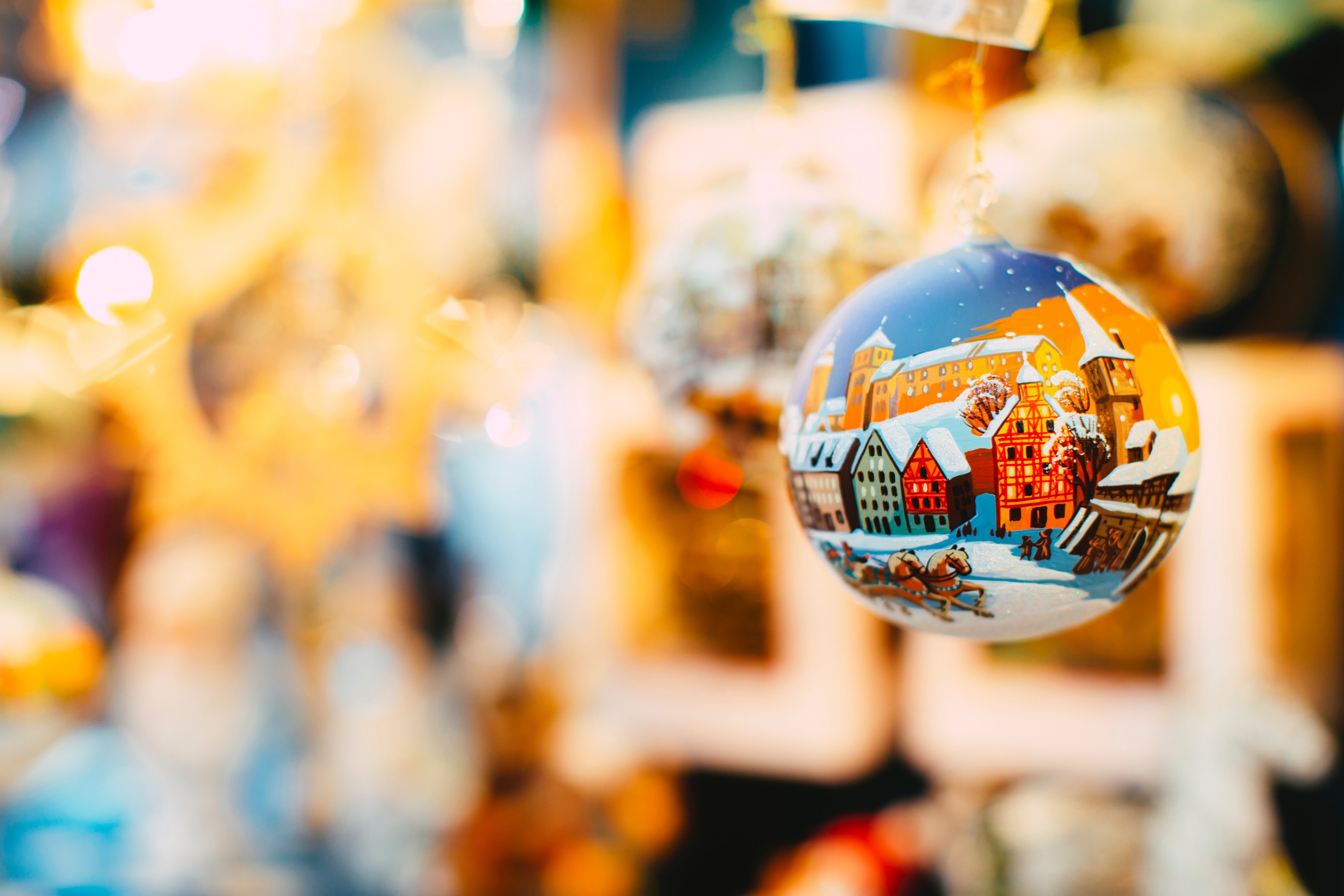 Christmas ornament with winter village scene HD Wallpaper