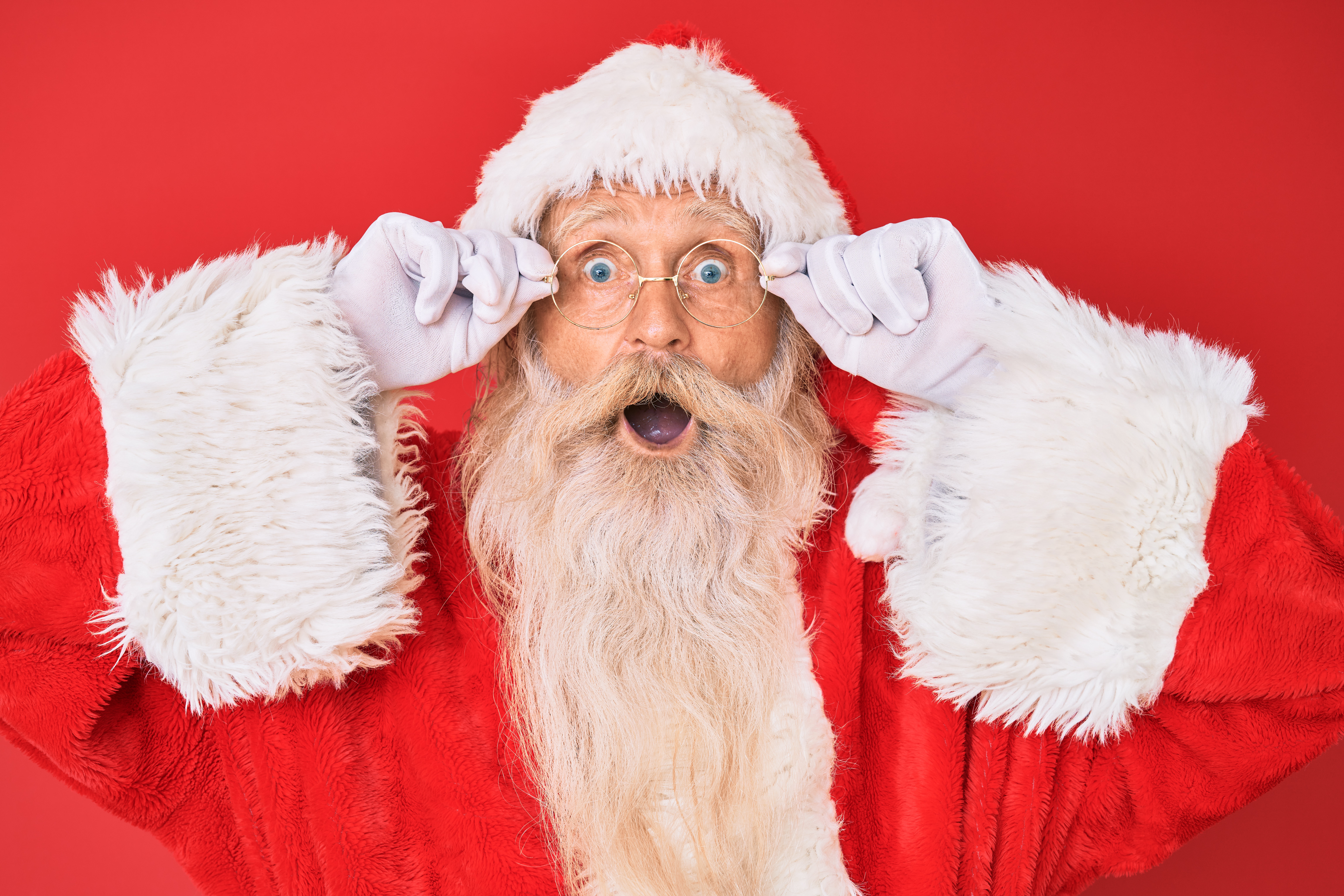 Santa Claus with blue eyes and beard HD Wallpaper