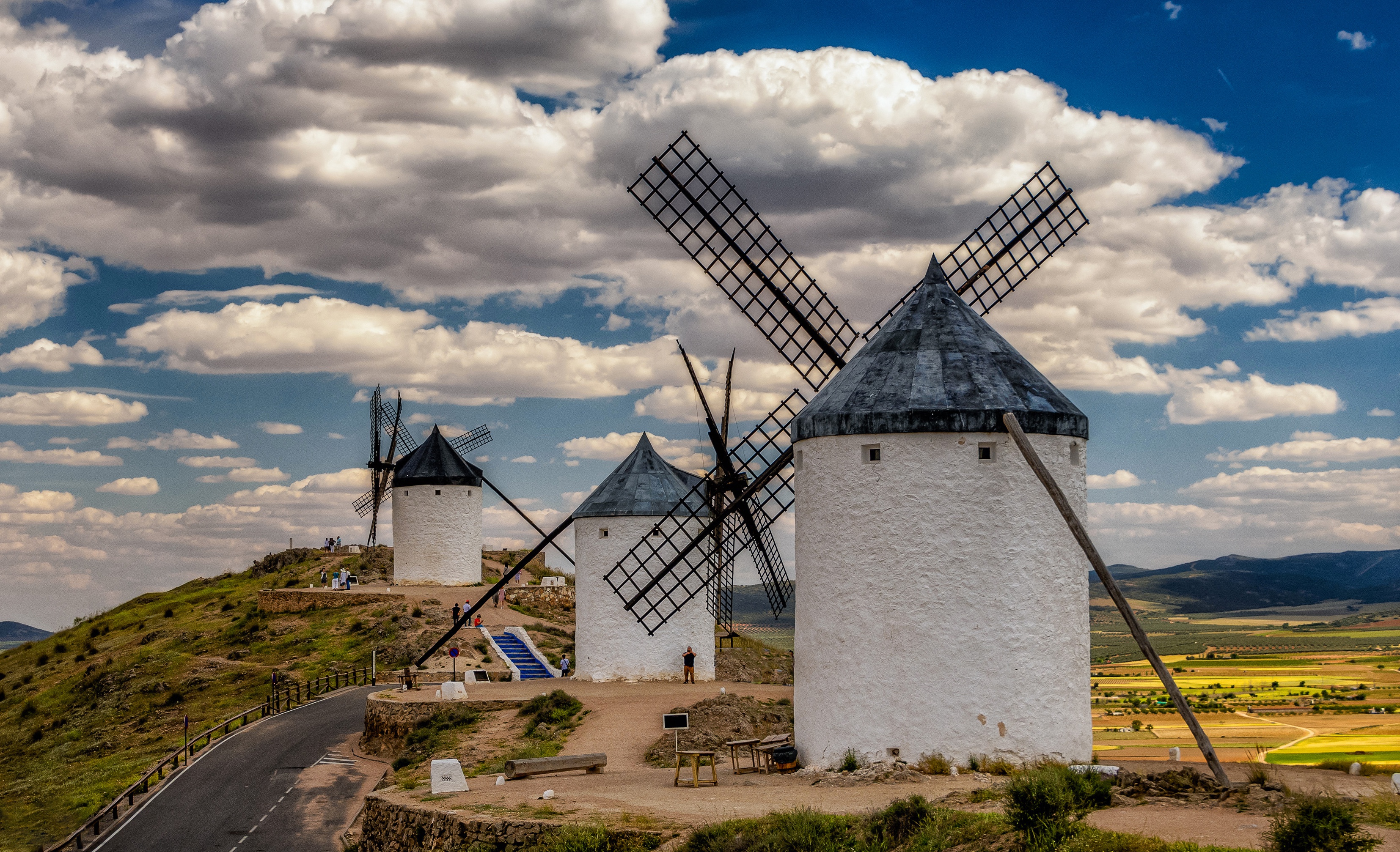 Windmills on a hill in Spain HD Wallpaper