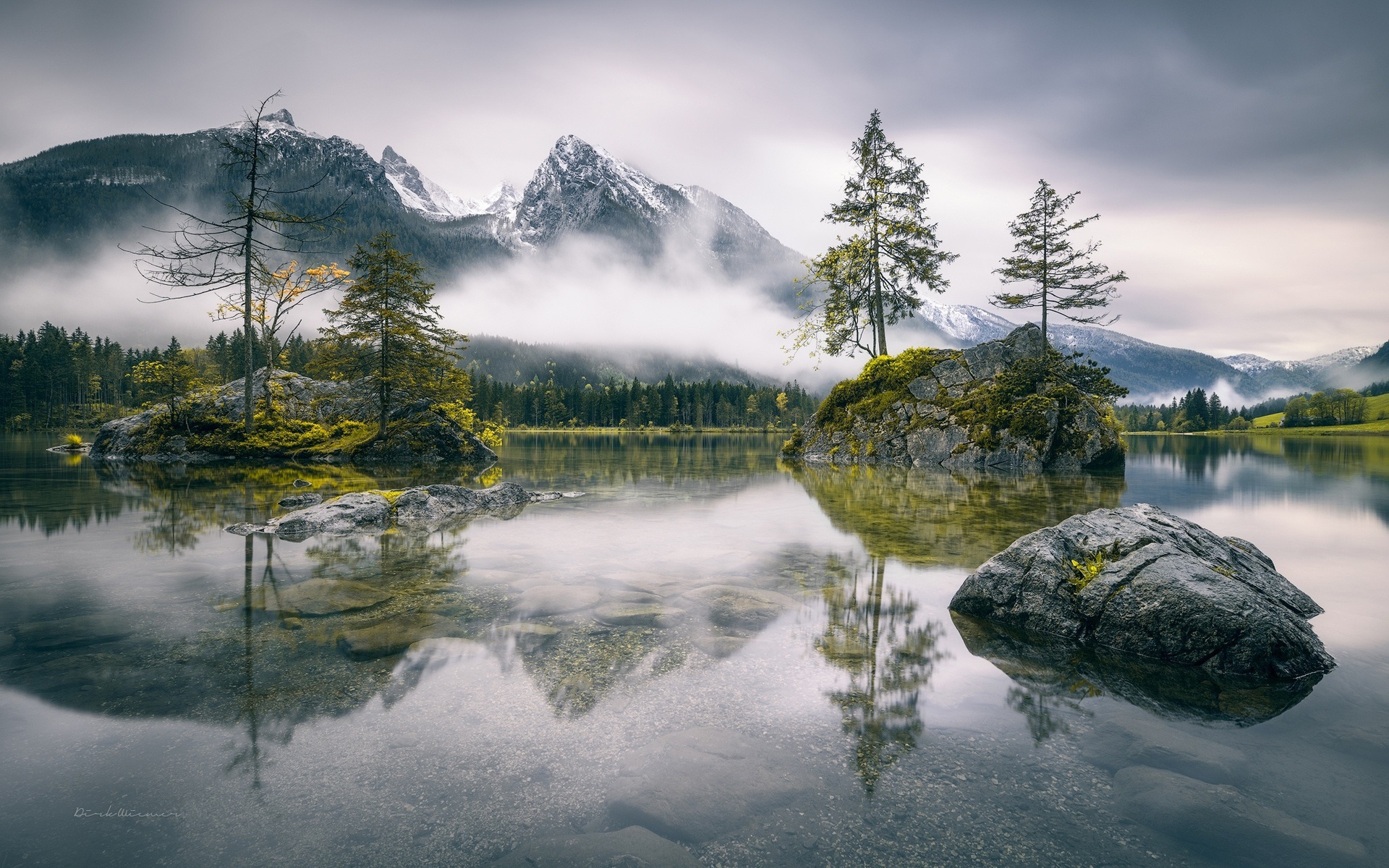 Lake with rocks and mountains in fog HD Wallpaper