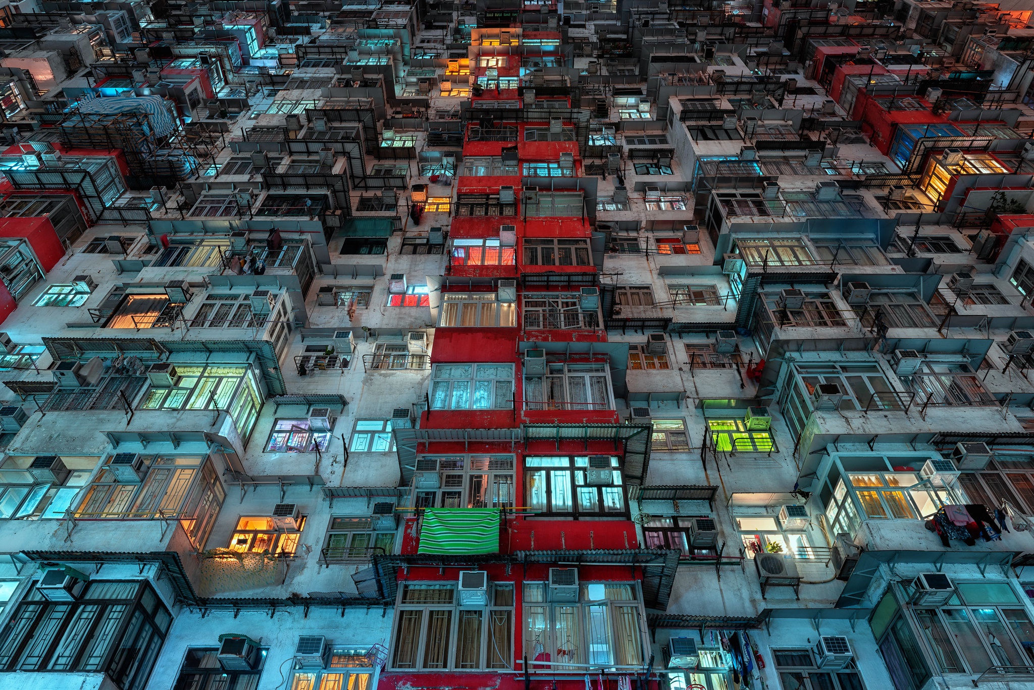 Dense apartment buildings in Hong Kong at night HD Wallpaper